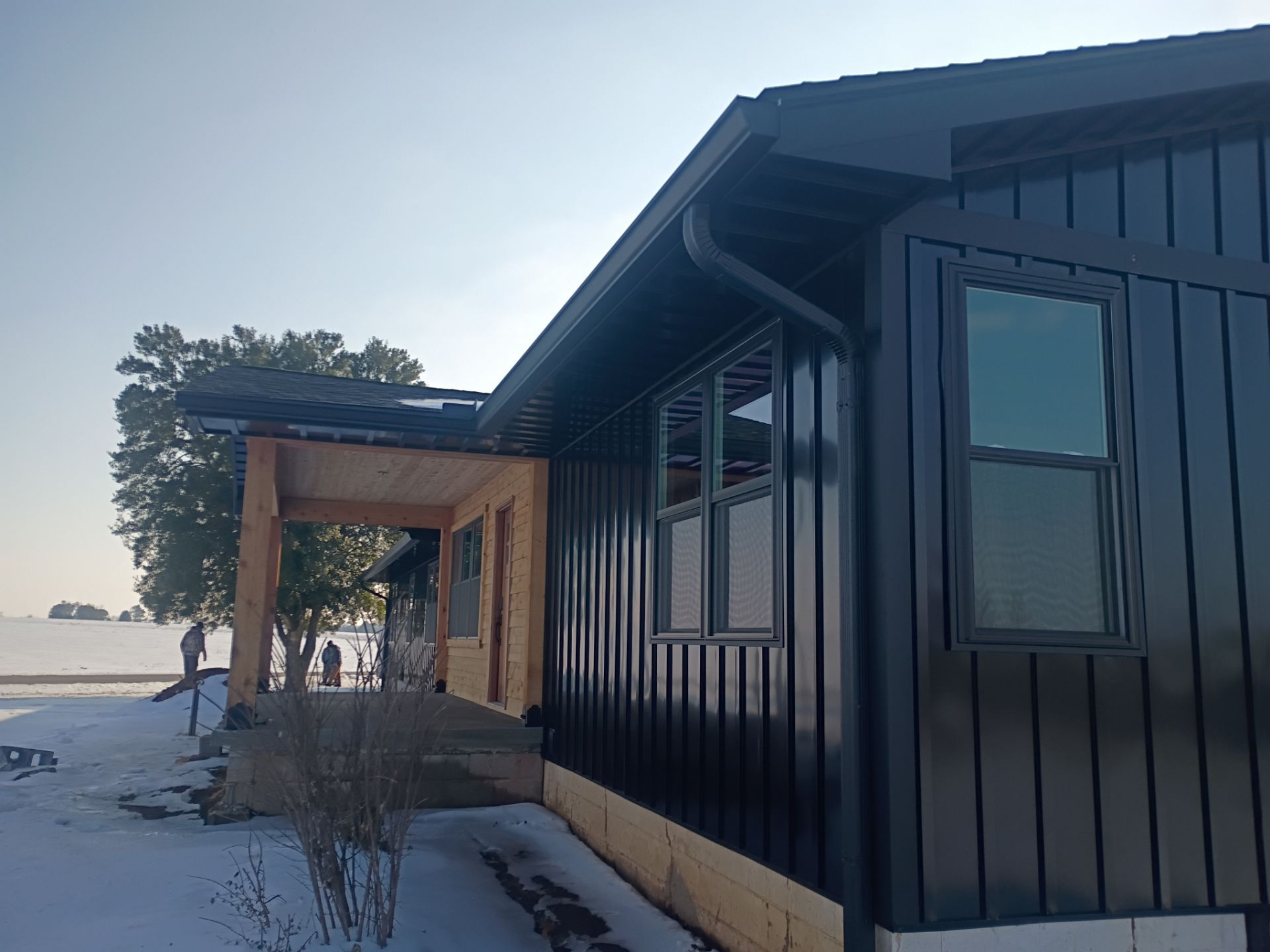 Black Gutter Install by First Choice Gutters LLC