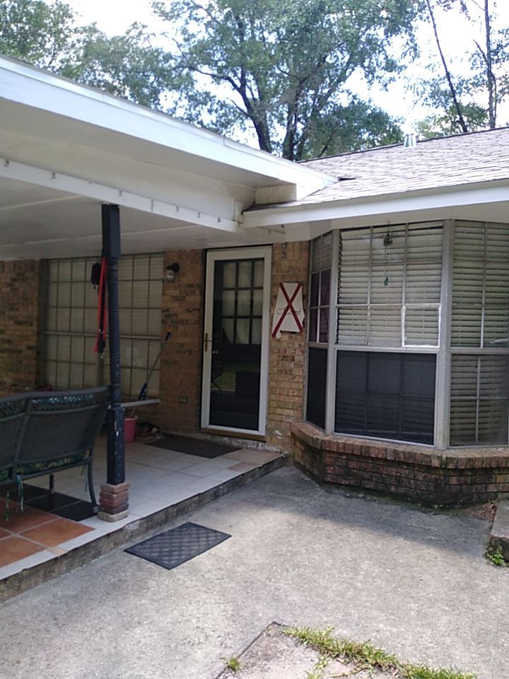 Residential Roofing Installation using Roof Replacement by American Roofing & Construction LLC