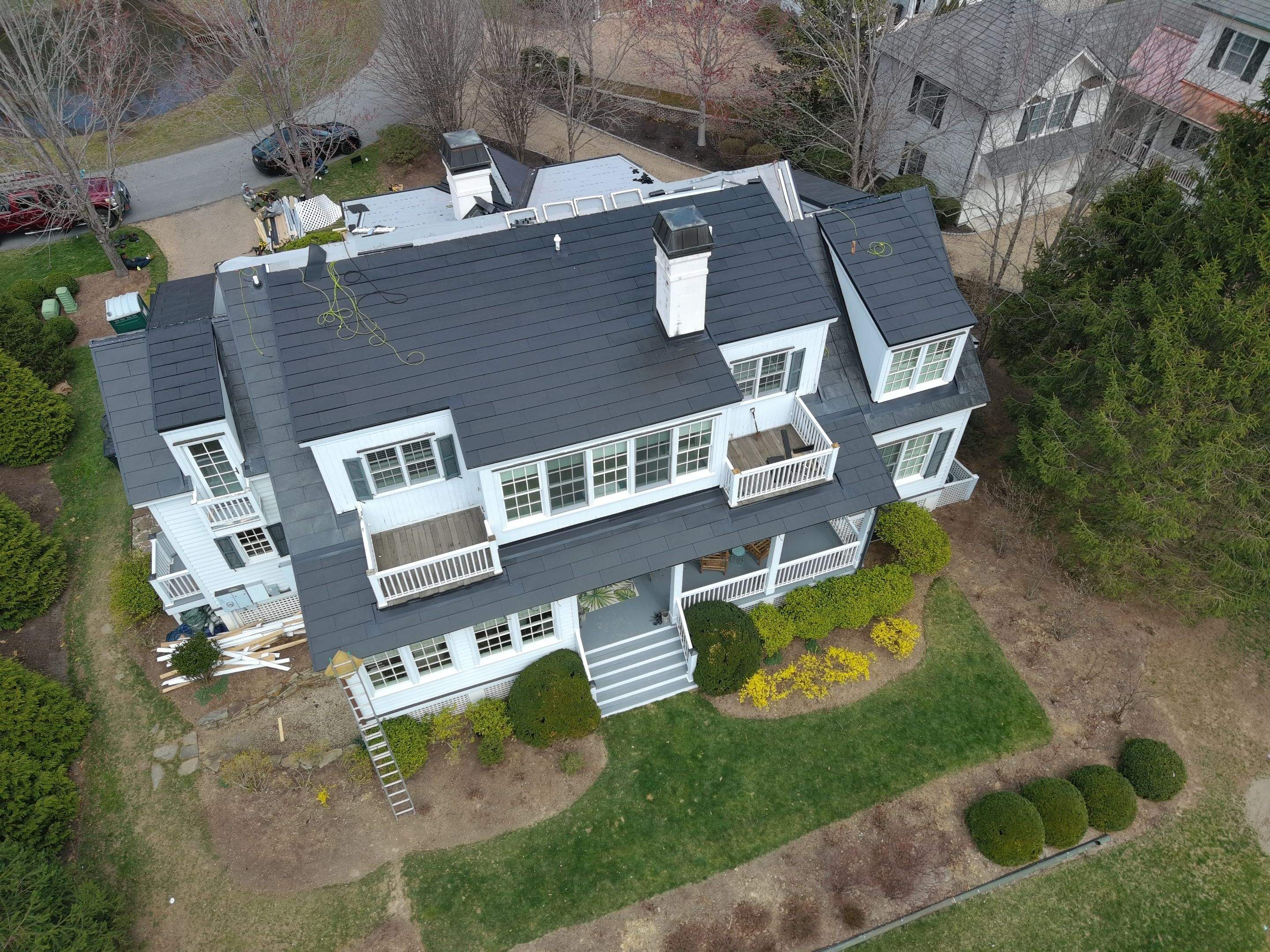 Tesla Solar Roof using Tesla Solar Roof by American Home Contractors