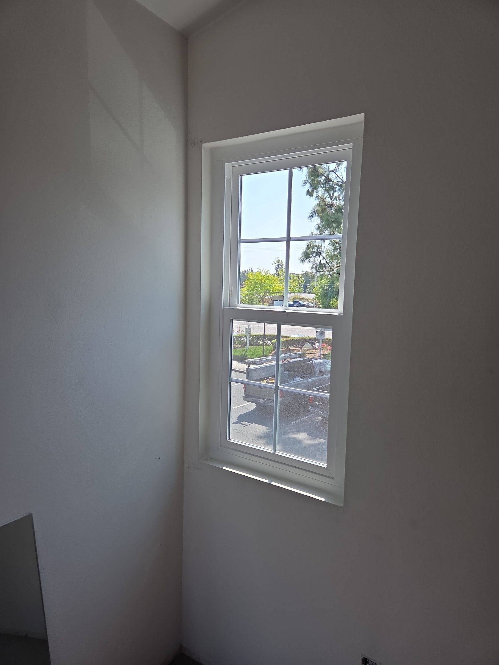 Window Installation using Milgard V300 Trinsic with grids by American Window Company