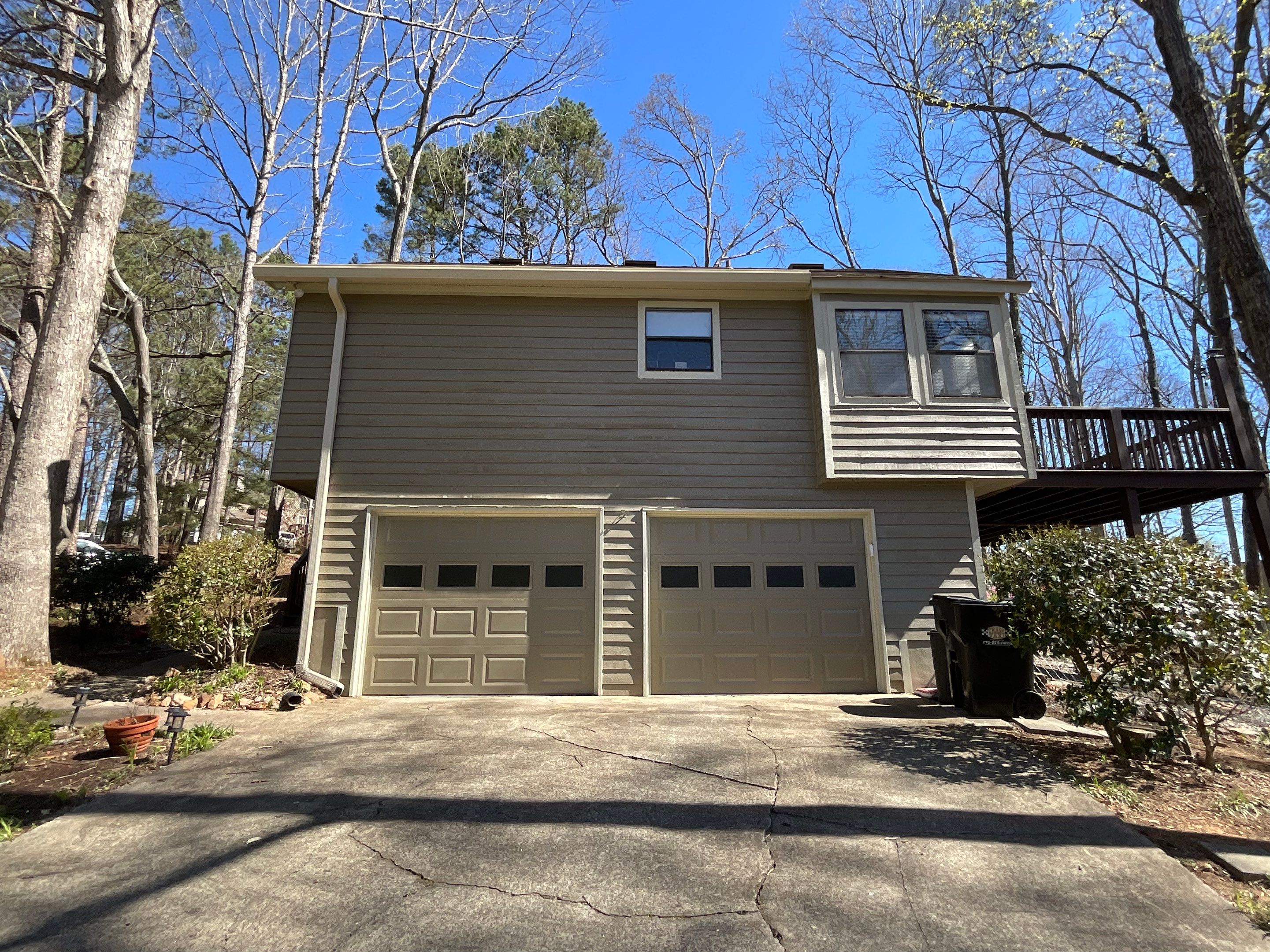 Exterior Painting and Deck Refinishing for an Acworth Residence by Swift Home Renovations