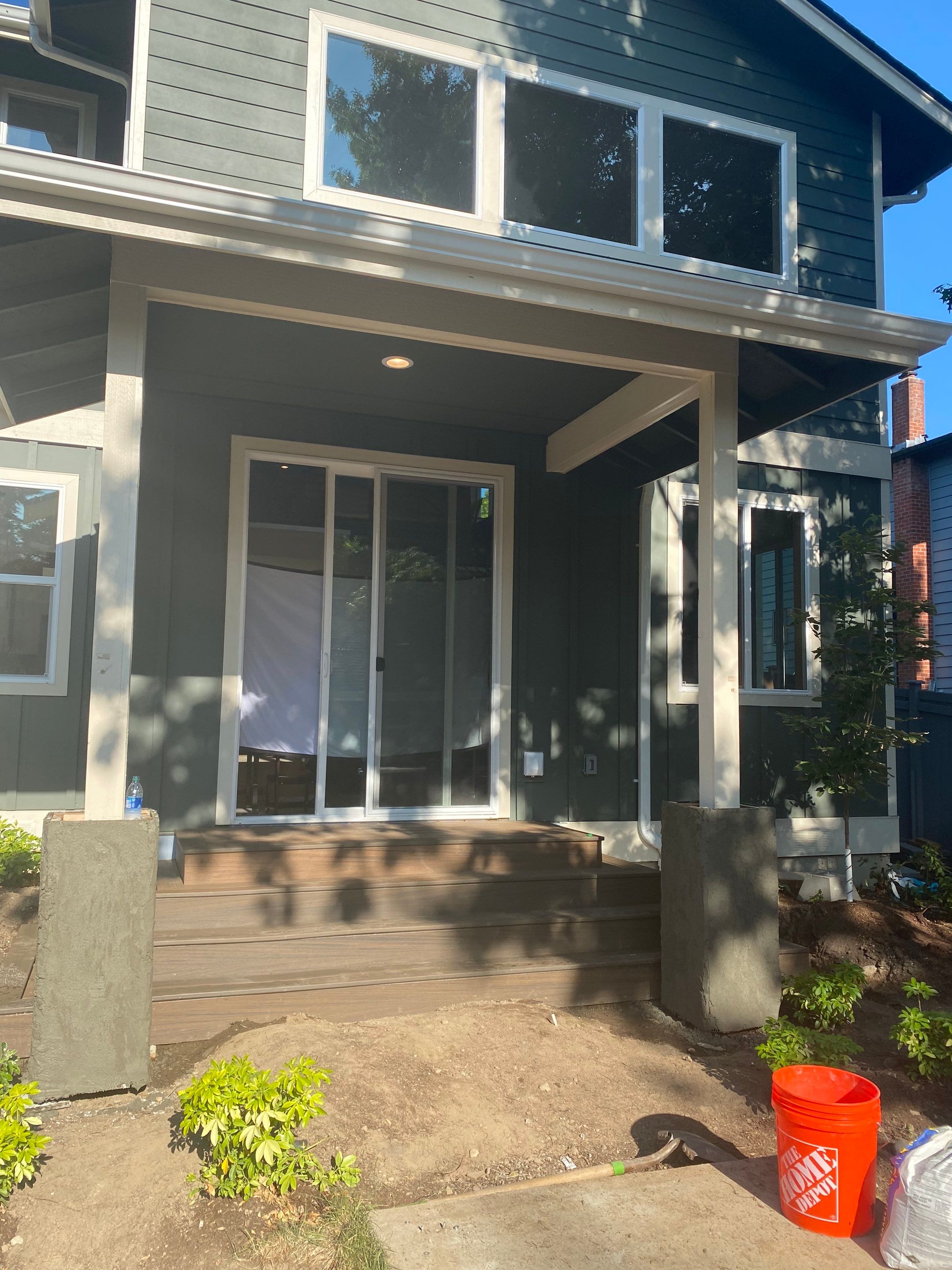 Patio Installation using Concrete, Retaining walls, and Turf install by Jireh Asphalt & Concrete Inc 