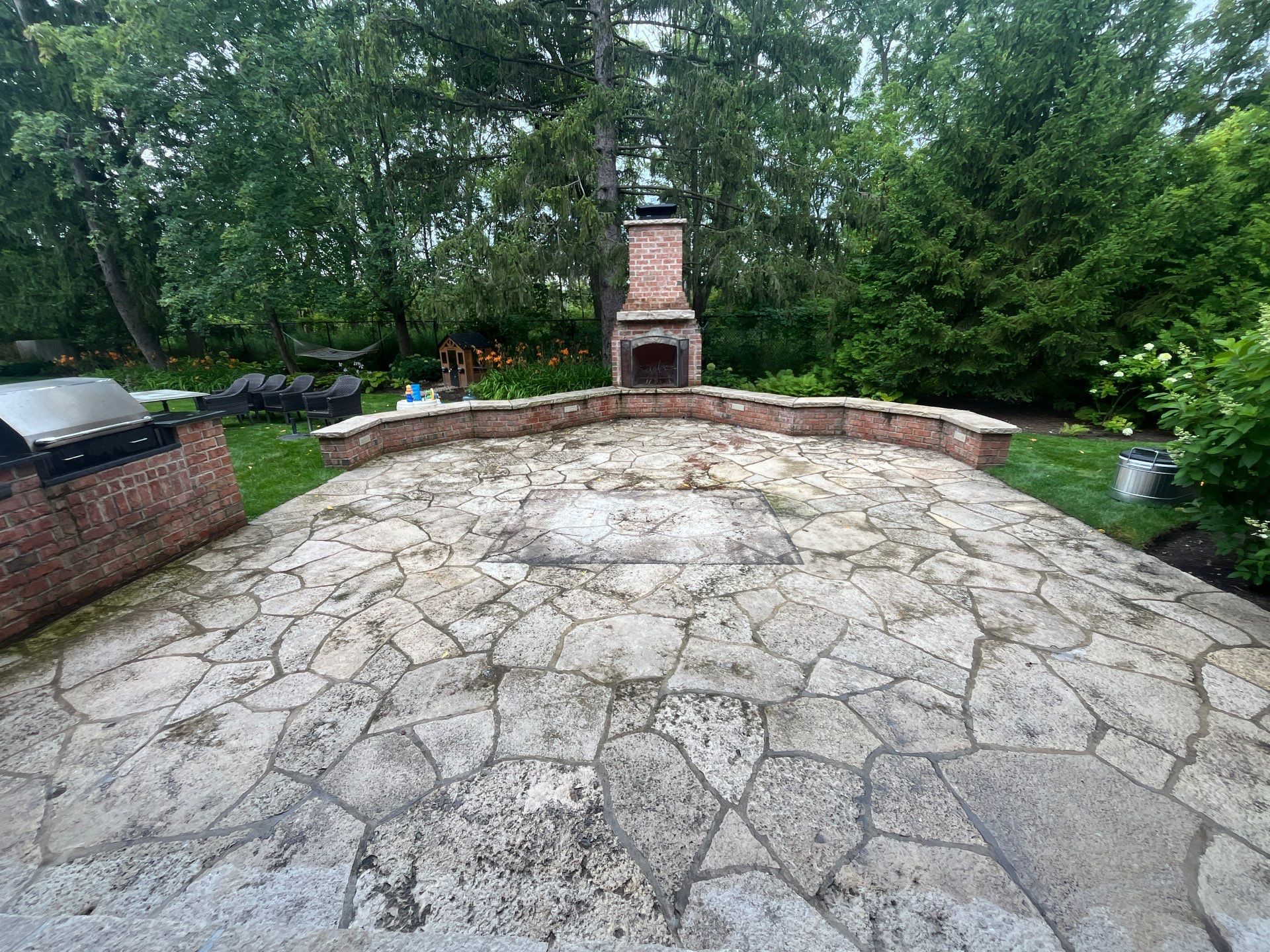 natural stone using Algaecide, soft wash soap by Northern Power Washing LLC.