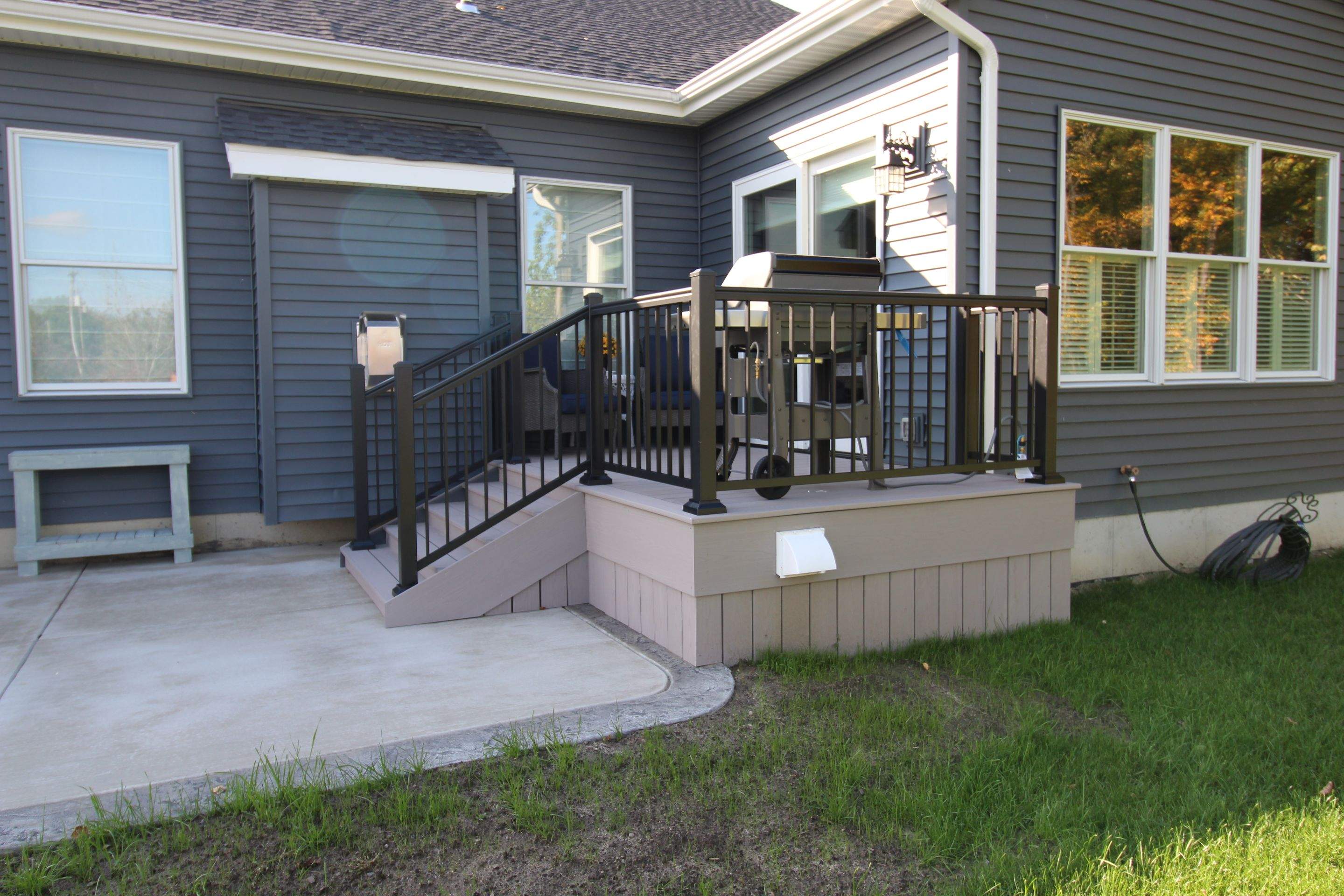 Outdoor Living- Deck and Concrete by Ivy Lea Construction