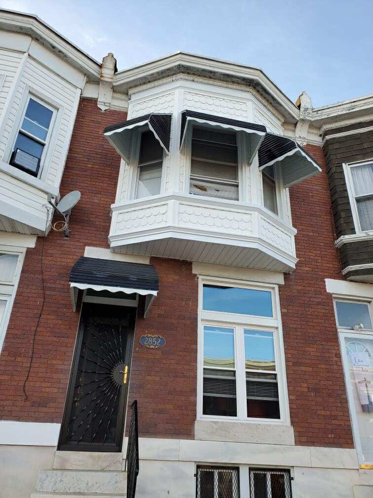 Window, Siding, and Door Replacement by American Home Contractors