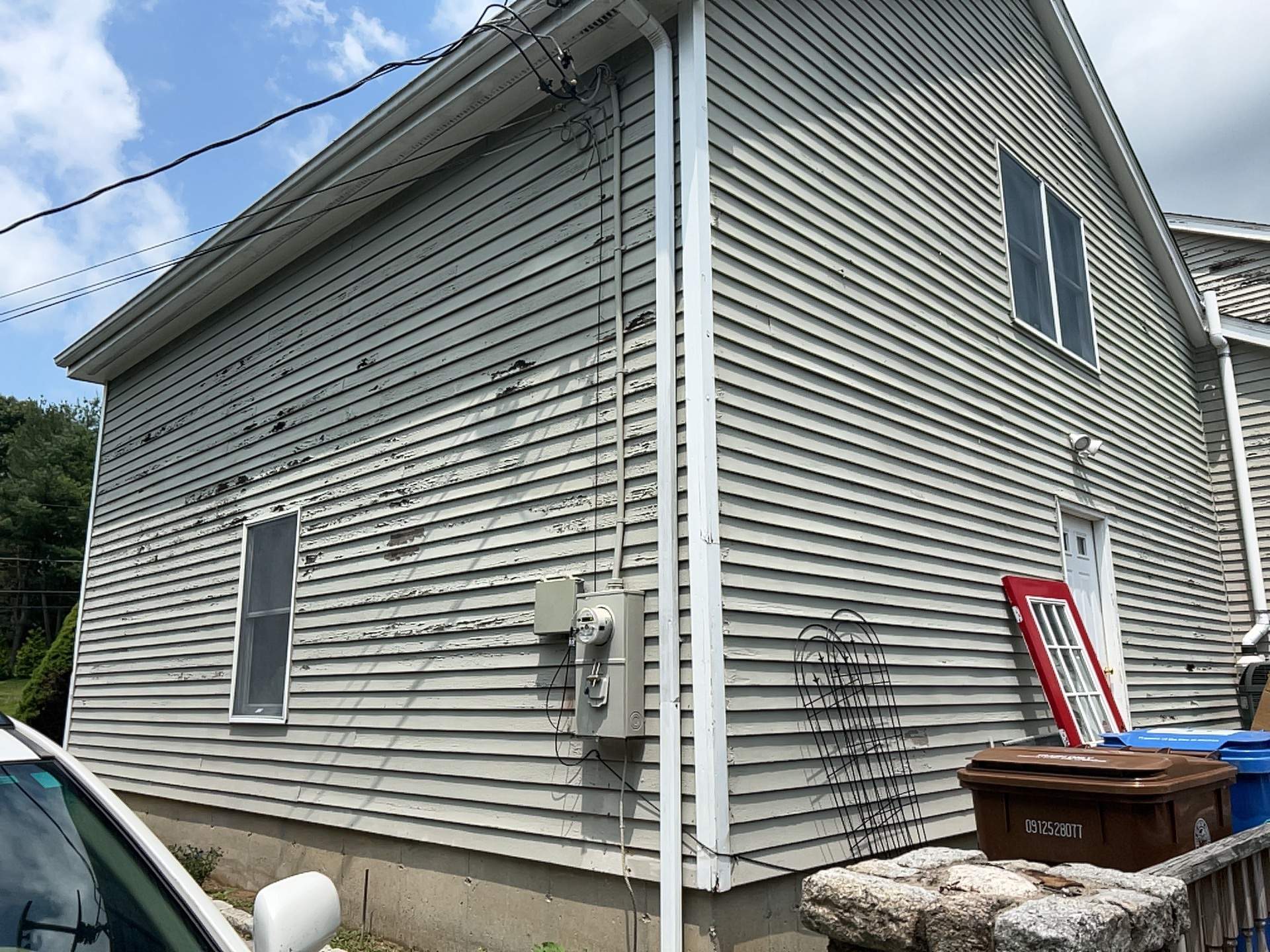 Siding Installation using Mainstreet Colonial & White gutters by A Plus Exterior