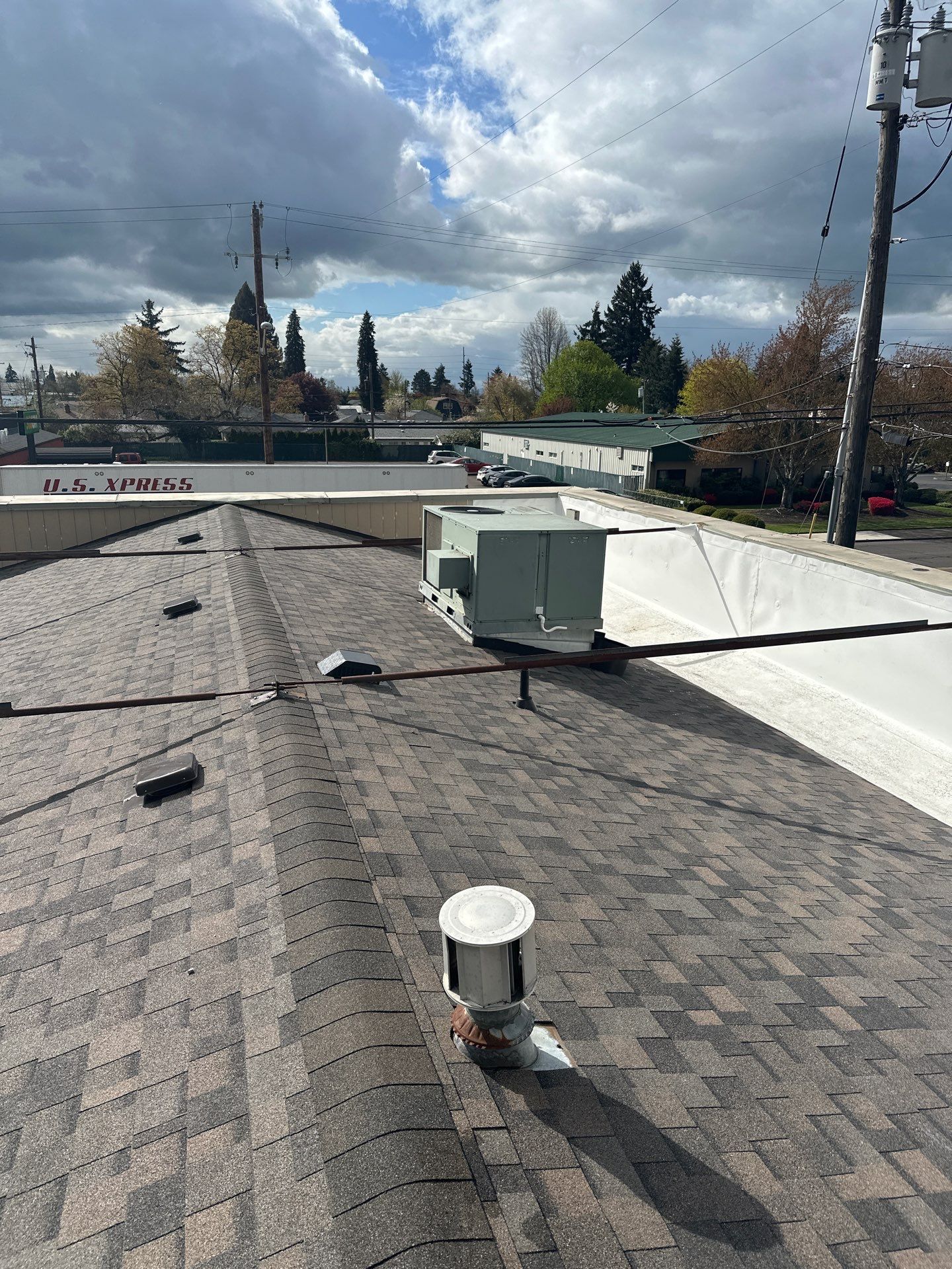 Commercial Roofing Installation using IKO Dynasty & GAF 60Mil TPO by Orezona Building & Roofing Company, Inc.