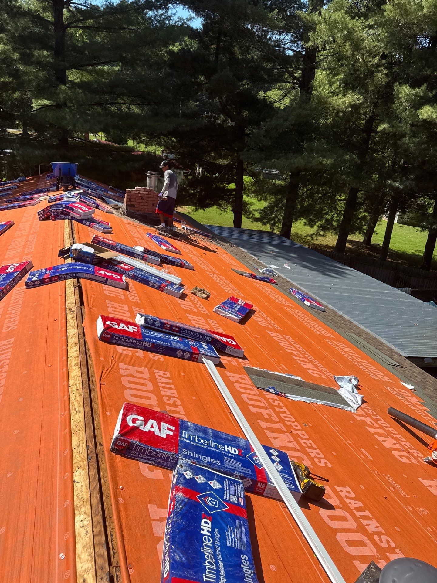 Residential Roofing Installation using GAF Timberline HDZ Charcoal by Rainstoppers Roofing