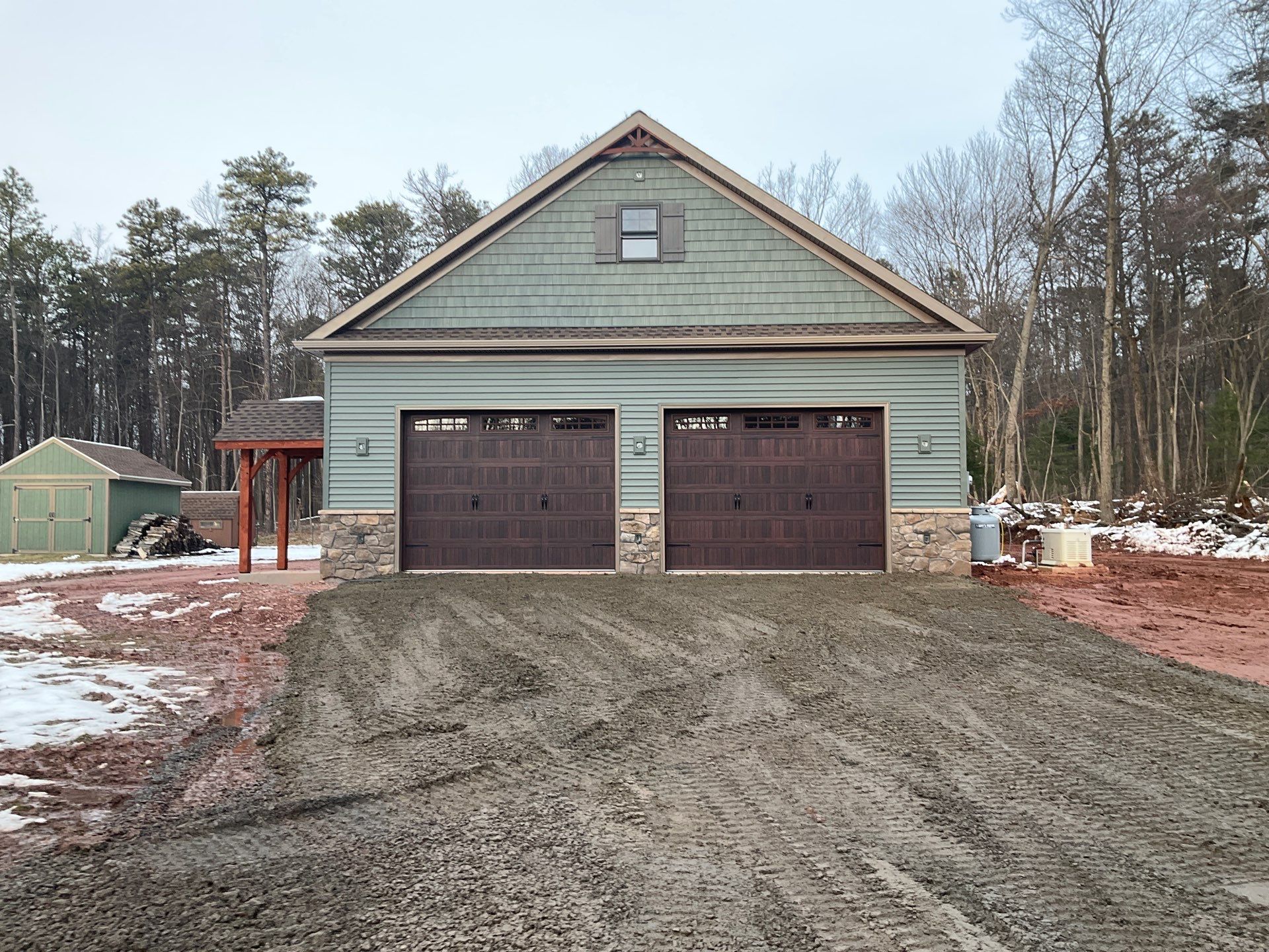 Custom Two-Story Garage with Finished Upper Leve by Esh Builders