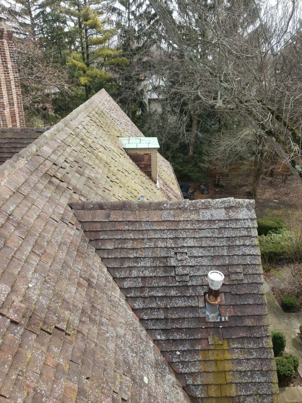 Ludowici Roof Installment and Half Round Copper Gutter Replacement  by Custom Installations