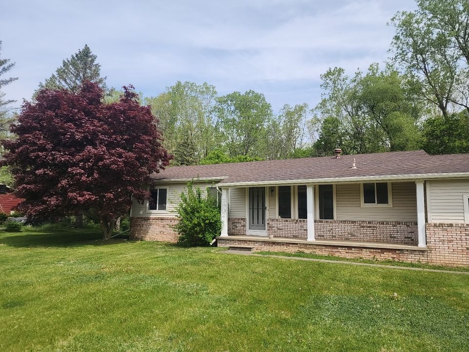 Weathered Wood Roof and Egress Window by 42 North Construction, LLC.