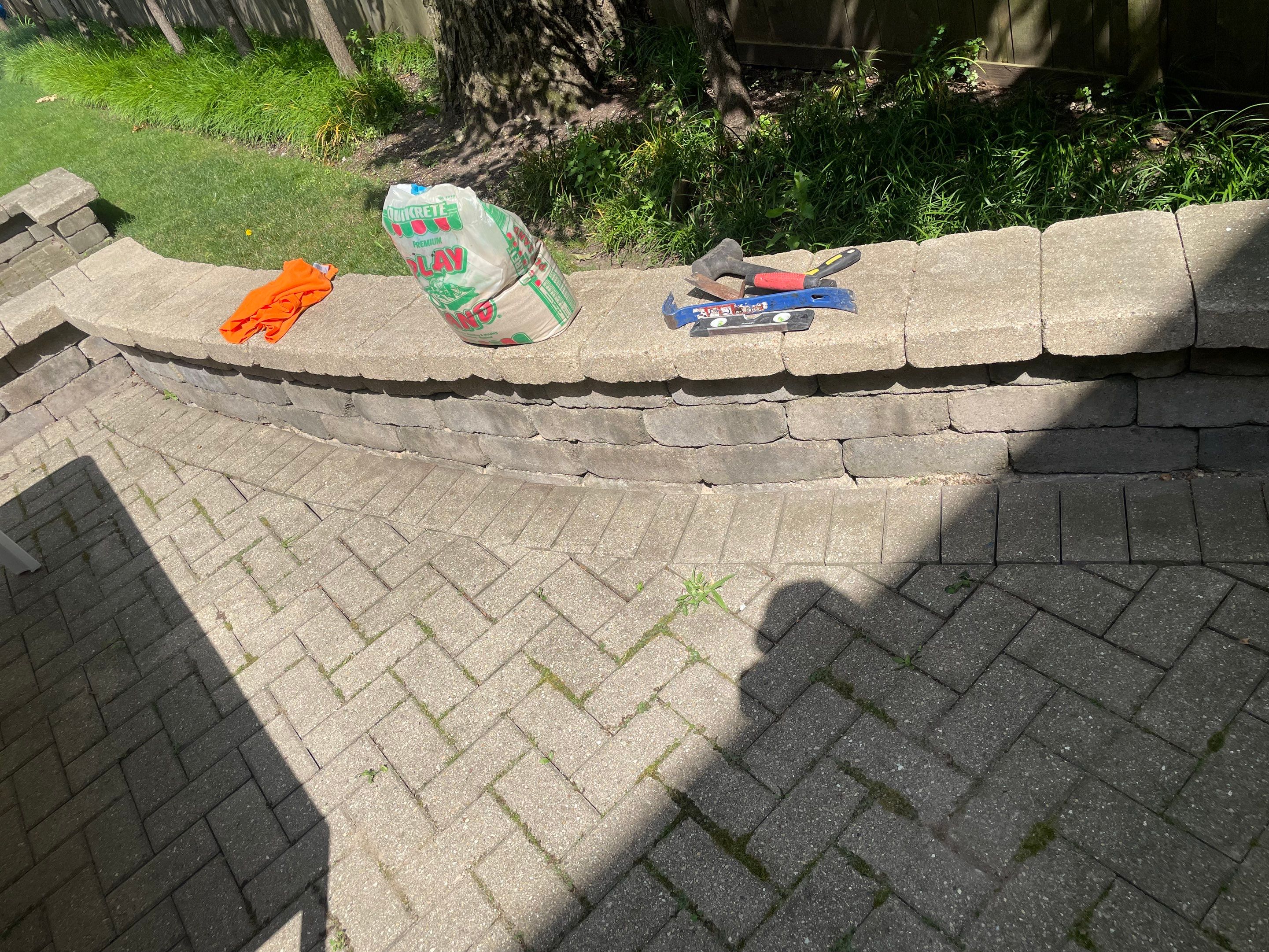 Brick patio repair, clean sand and seal by Northern Power Washing LLC.