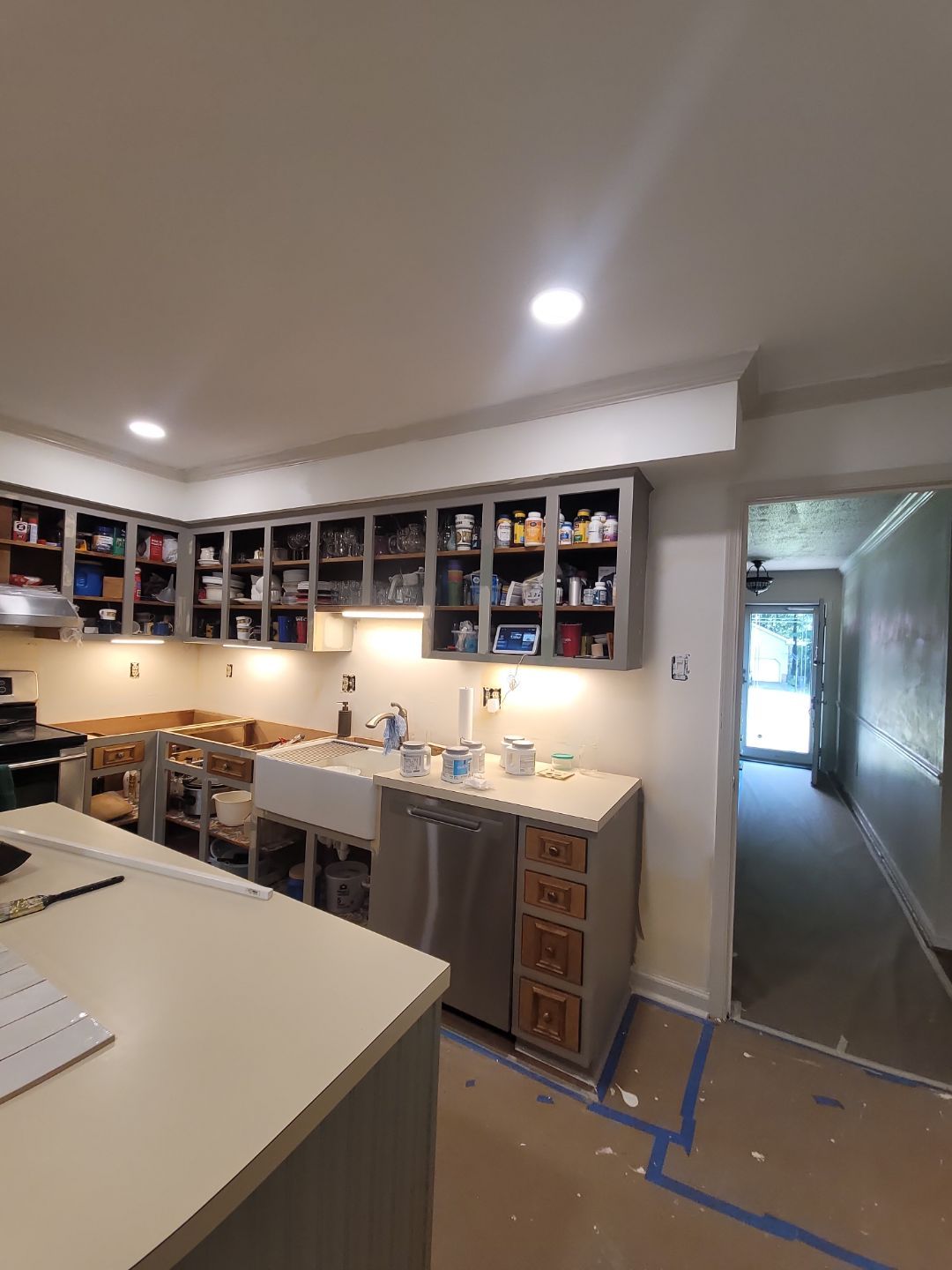 A Pathway to Personality – A Two-Tone Kitchen Transformation in Apex by Elite Remodeling and Design LLC