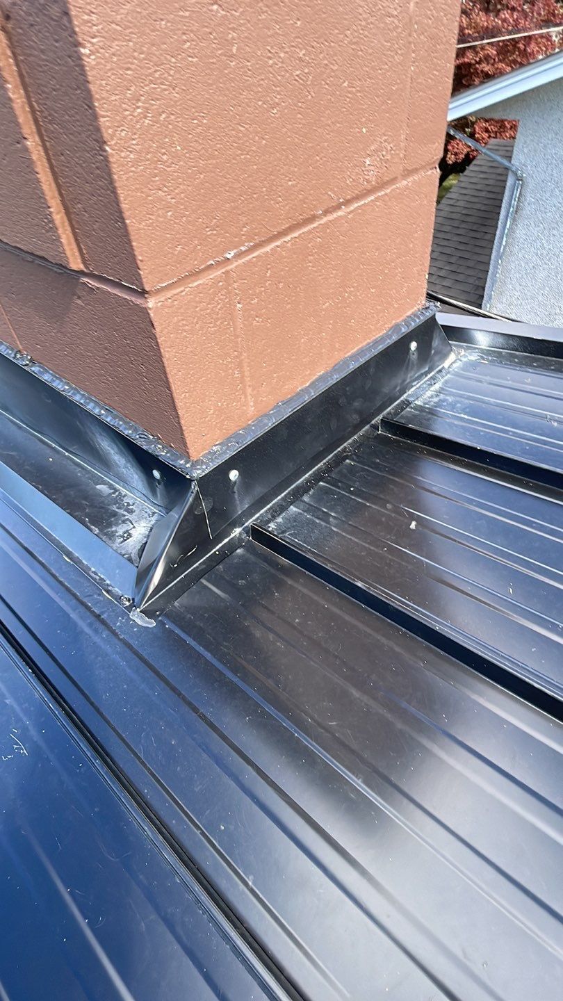 Residential Roofing Installation using 12" Prolok metal  by Top Notch Roofing Inc