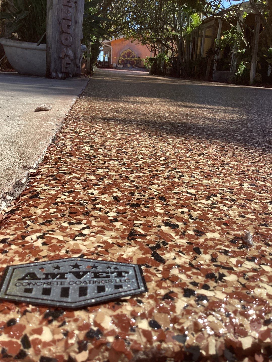 Sidewalks and Porches using Chestnut by Amvet concrete coatings llc