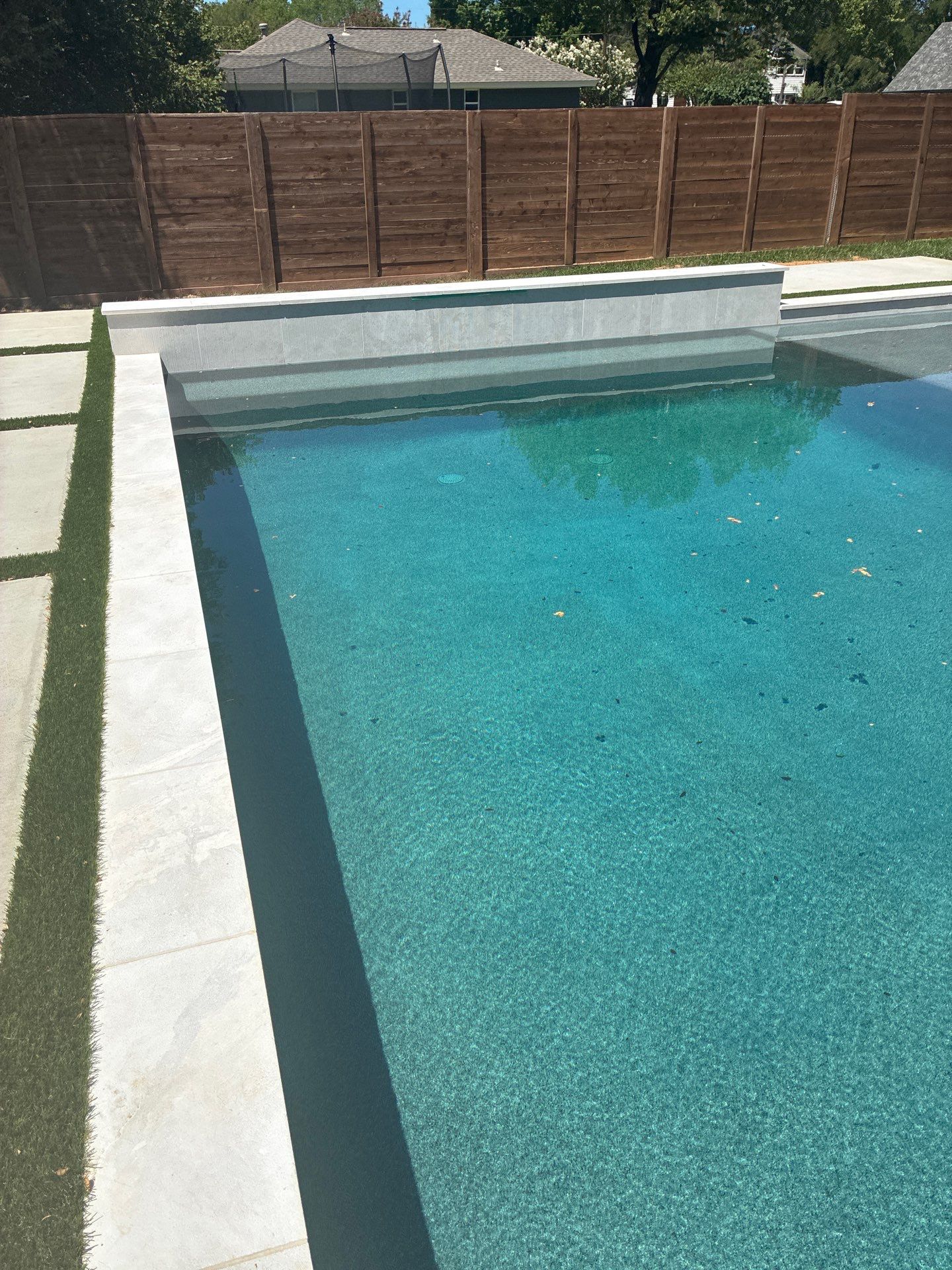 Modern Geometric Pool with Integrated Spa and Turf-Inlaid Decking by Pinnacle Pools and Spas - DFW