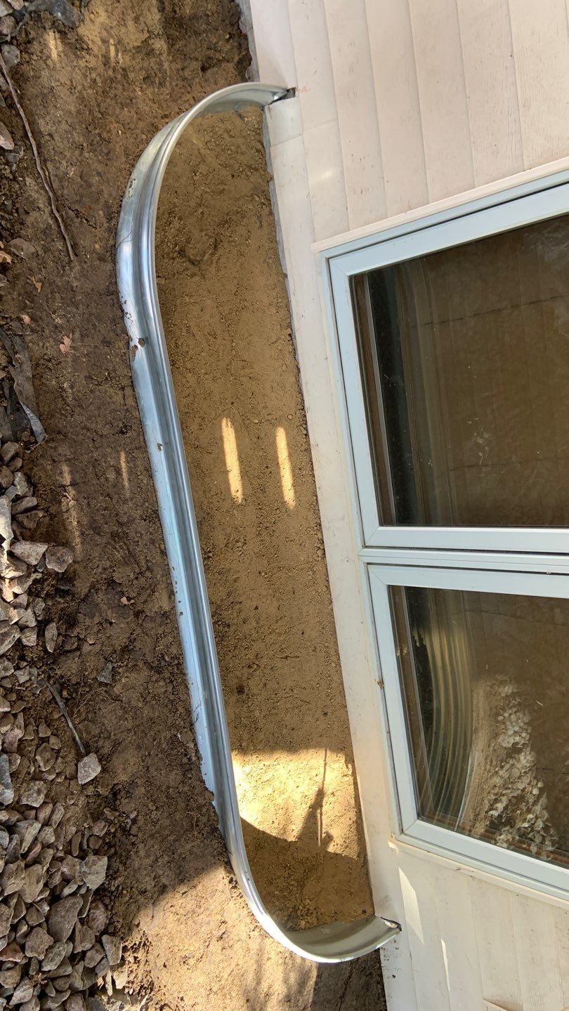 Basement Window Well & Drainage Board in Maple Grove, MN by Waterproofing Northeast