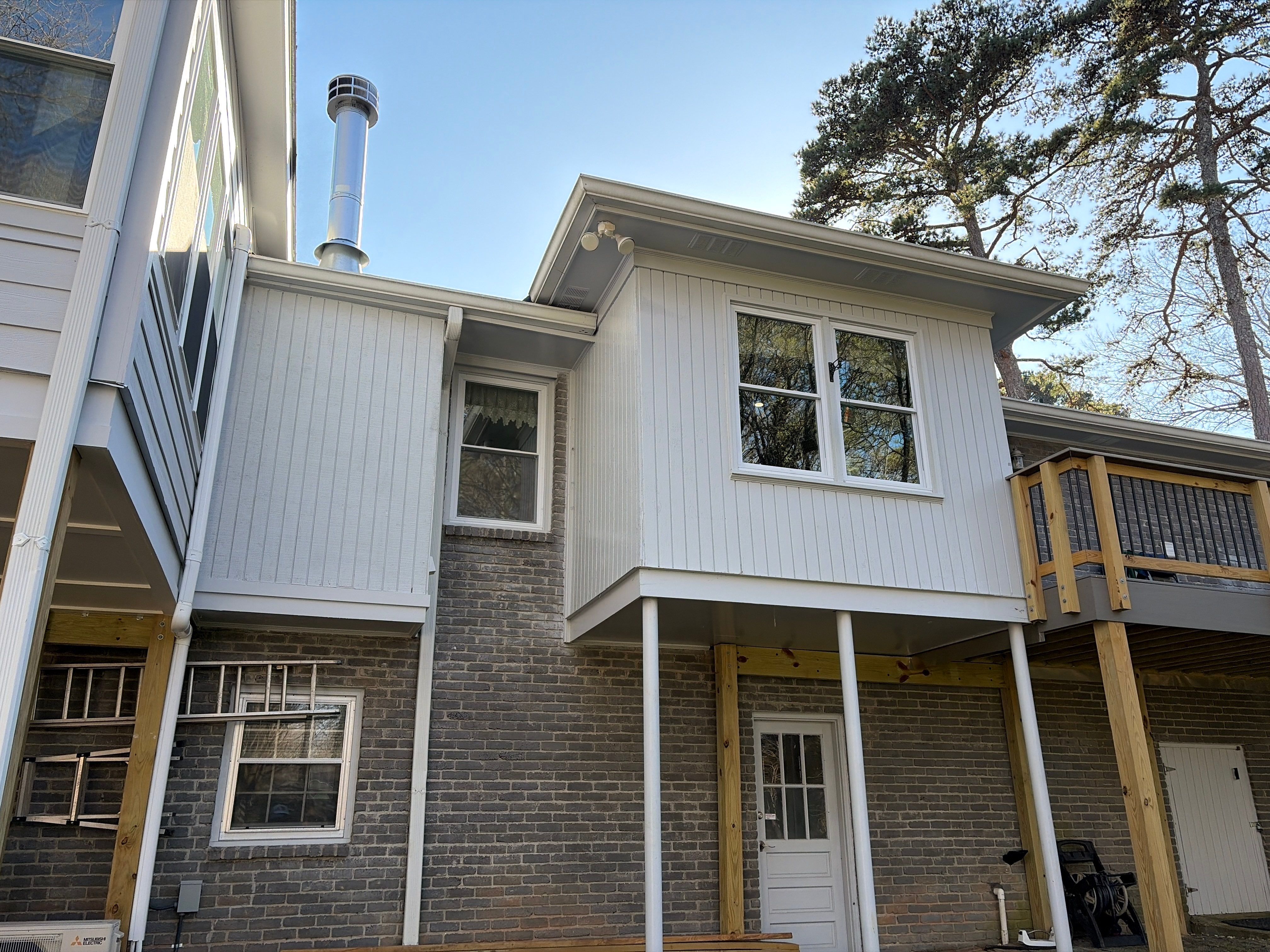 James Hardie Siding Replacement, Trex Railing Install, Exterior Painting, and Staining in Stone Mountain, GA by Nelson Exteriors 