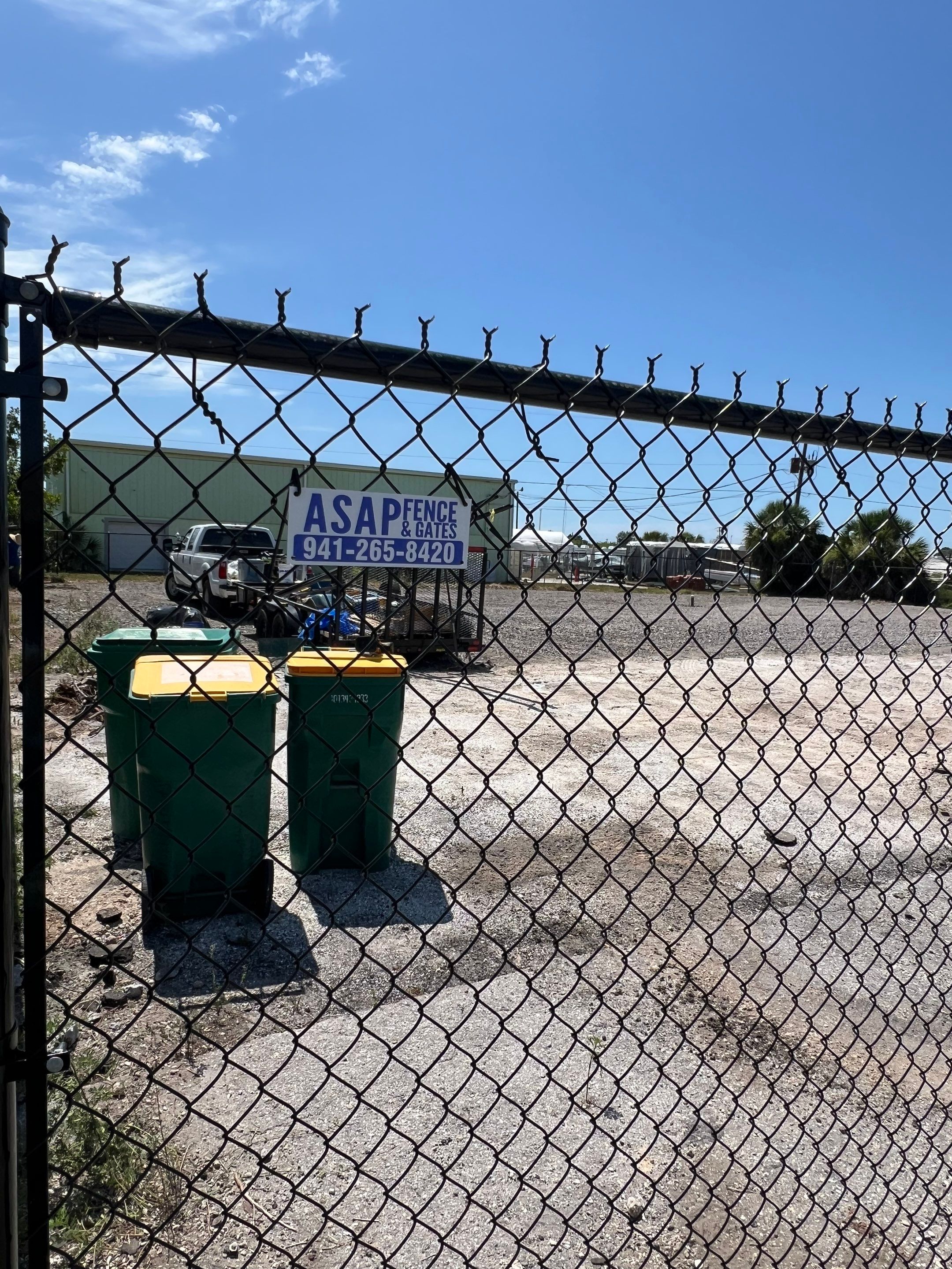 Chain-link Fence Installation using 6ft Black Chain Link Fence  by Asap fence and gates, LLC
