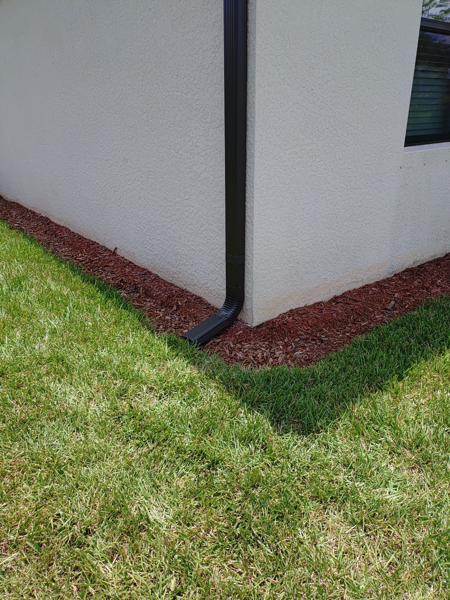 Black 6-Inch Seamless Gutters in Fort Myers FL by Gutter Professor by Gutter Professors