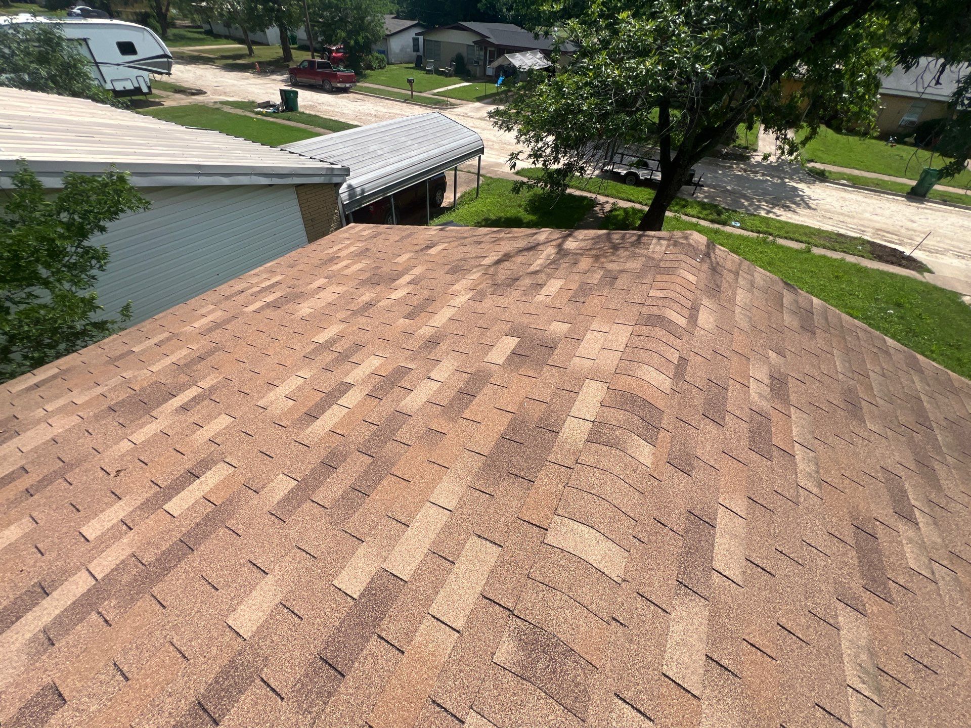 Residential Roofing Installation using IKO Cambridge Dual Black and Mule Hide Rolled Roofing Base and Cap Sheet by WR Roofing Solutions