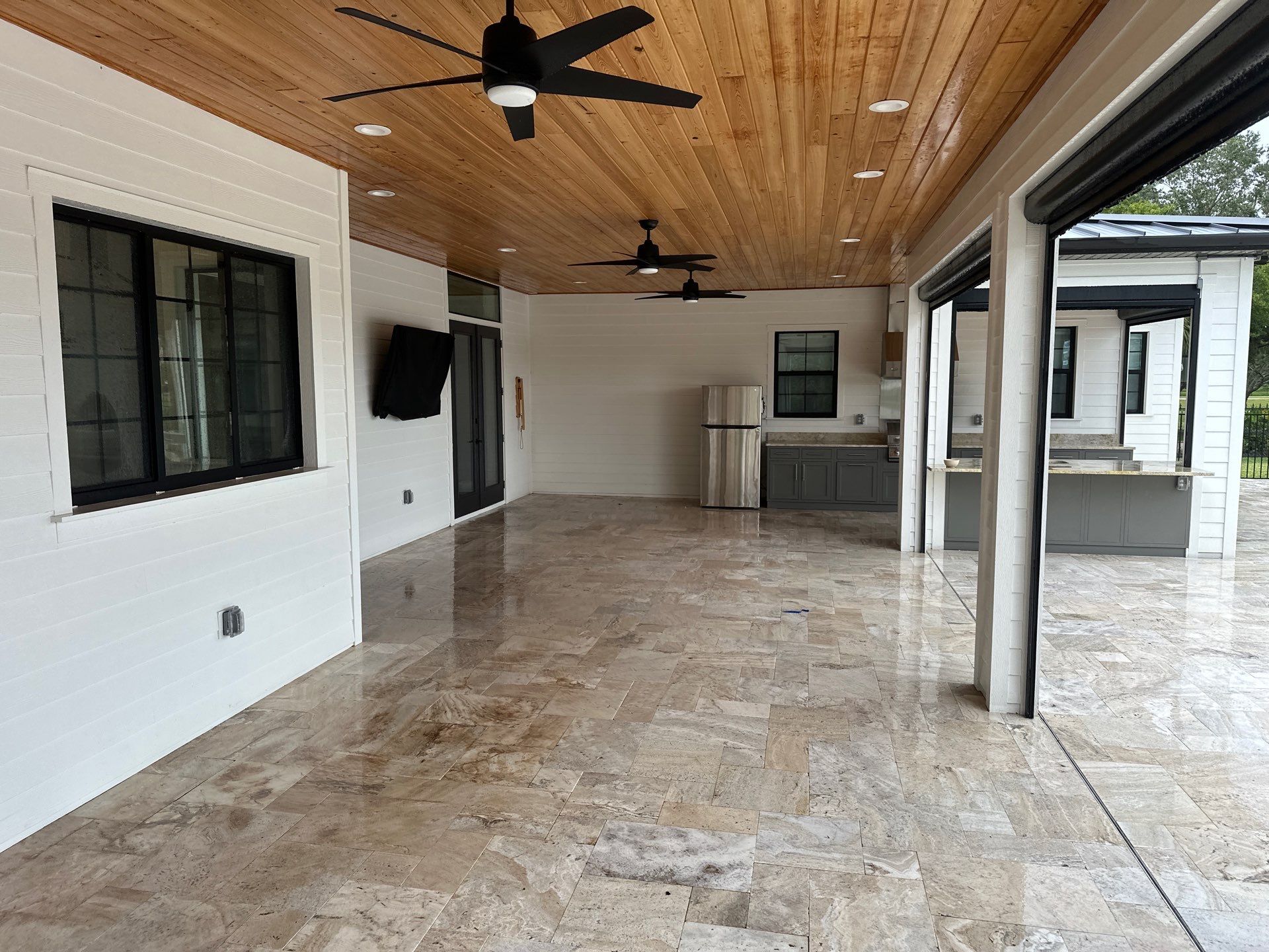 Complete Two-Story House Wash and Driveway Cleaning in Winding River Community, Bradenton, FL by Sunshine AquaWash