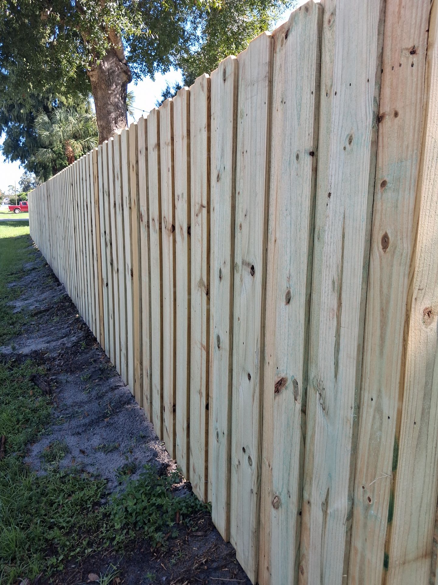 Wood Privacy Fence Installation with Double Gate in Port Charlotte by True Fence LLC
