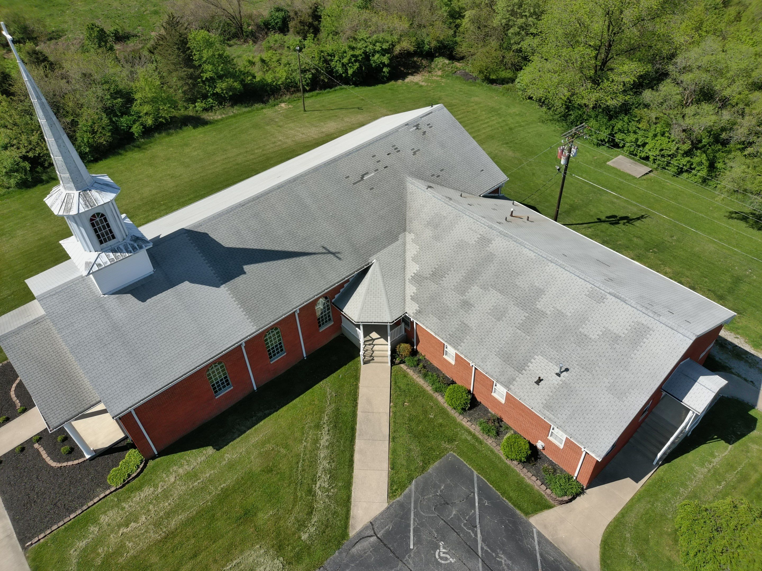 Commercial Roofing Installation using Performance Shingles by Mr. Roofer