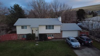 Residential Roofing Installation with Architectural Shingles and Chimney Repair