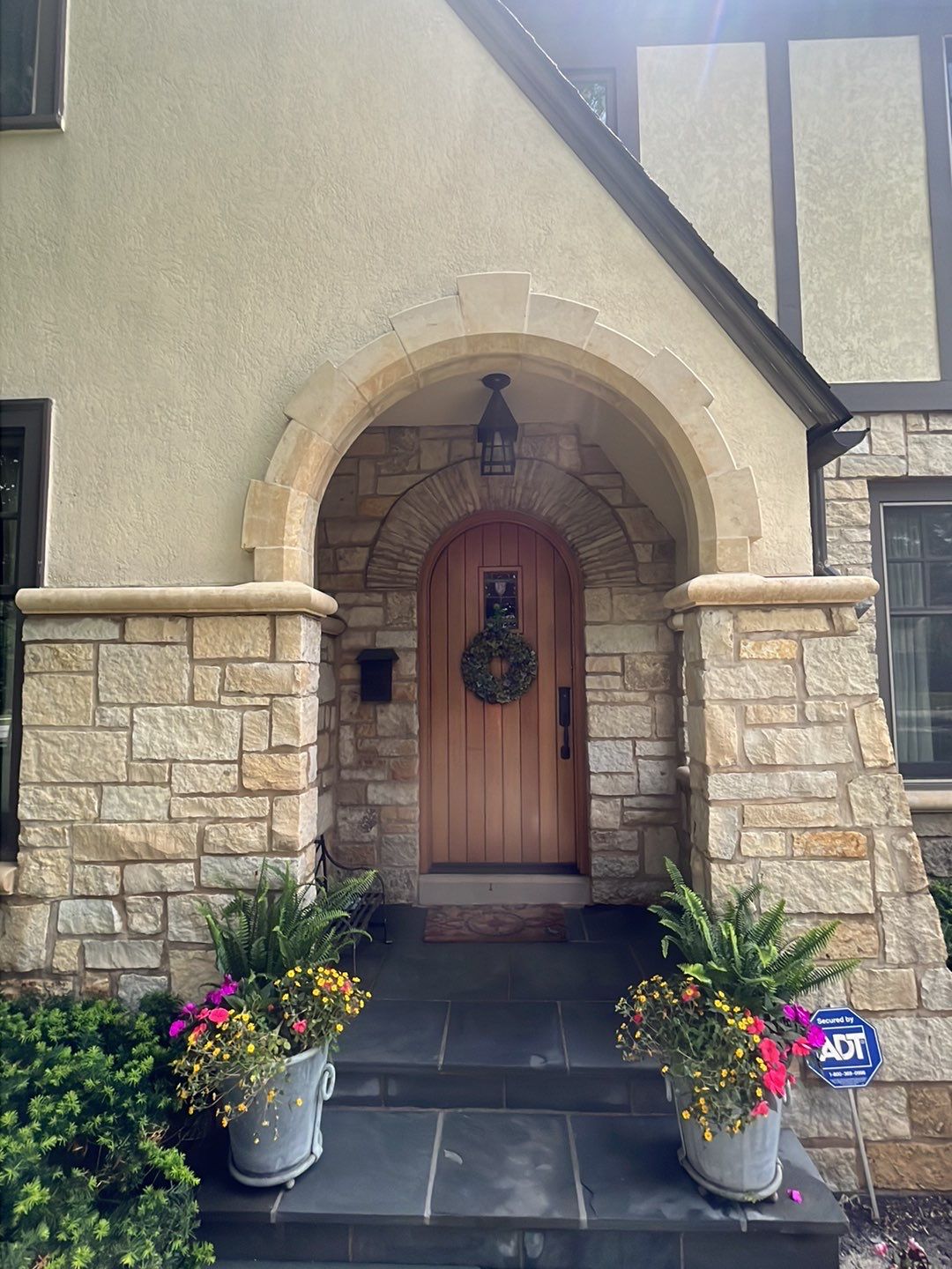 Northbrook, IL stucco home soft wash and stone cleaning by Northern Power Washing LLC.