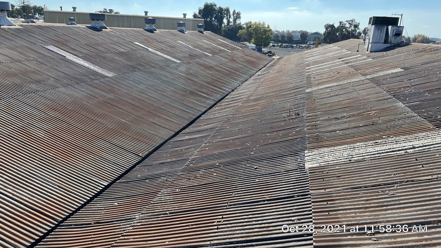 MR Roofing system using Conklin BenchPly system with PUMA top coat by Straight Edge Roofing Inc