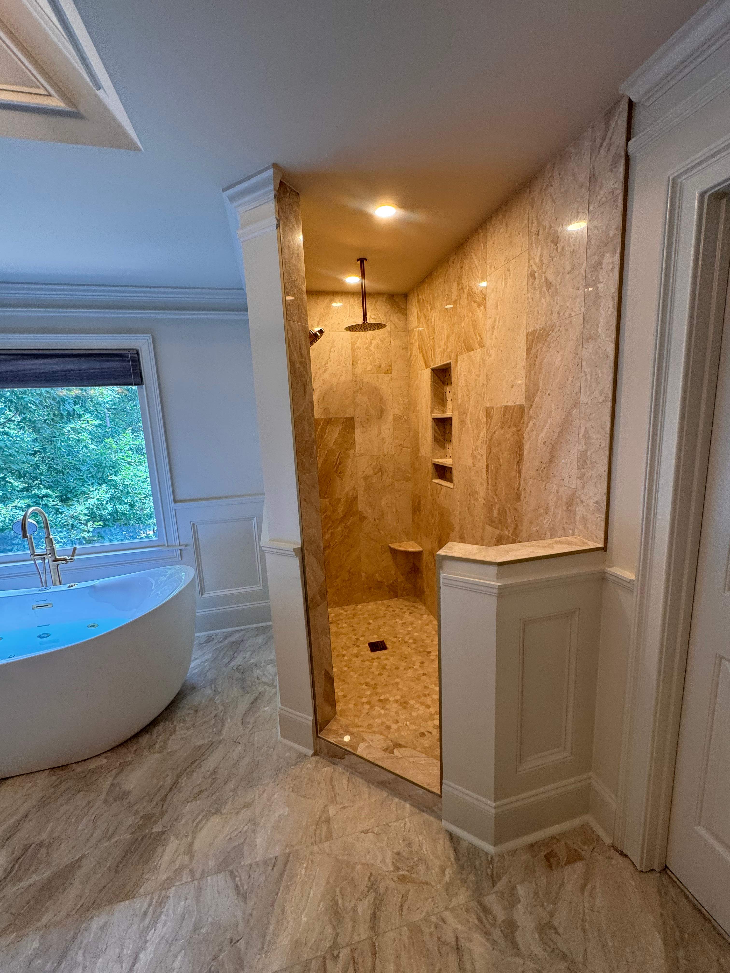 Master bathroom renovation using Free standing tub by Prudencio