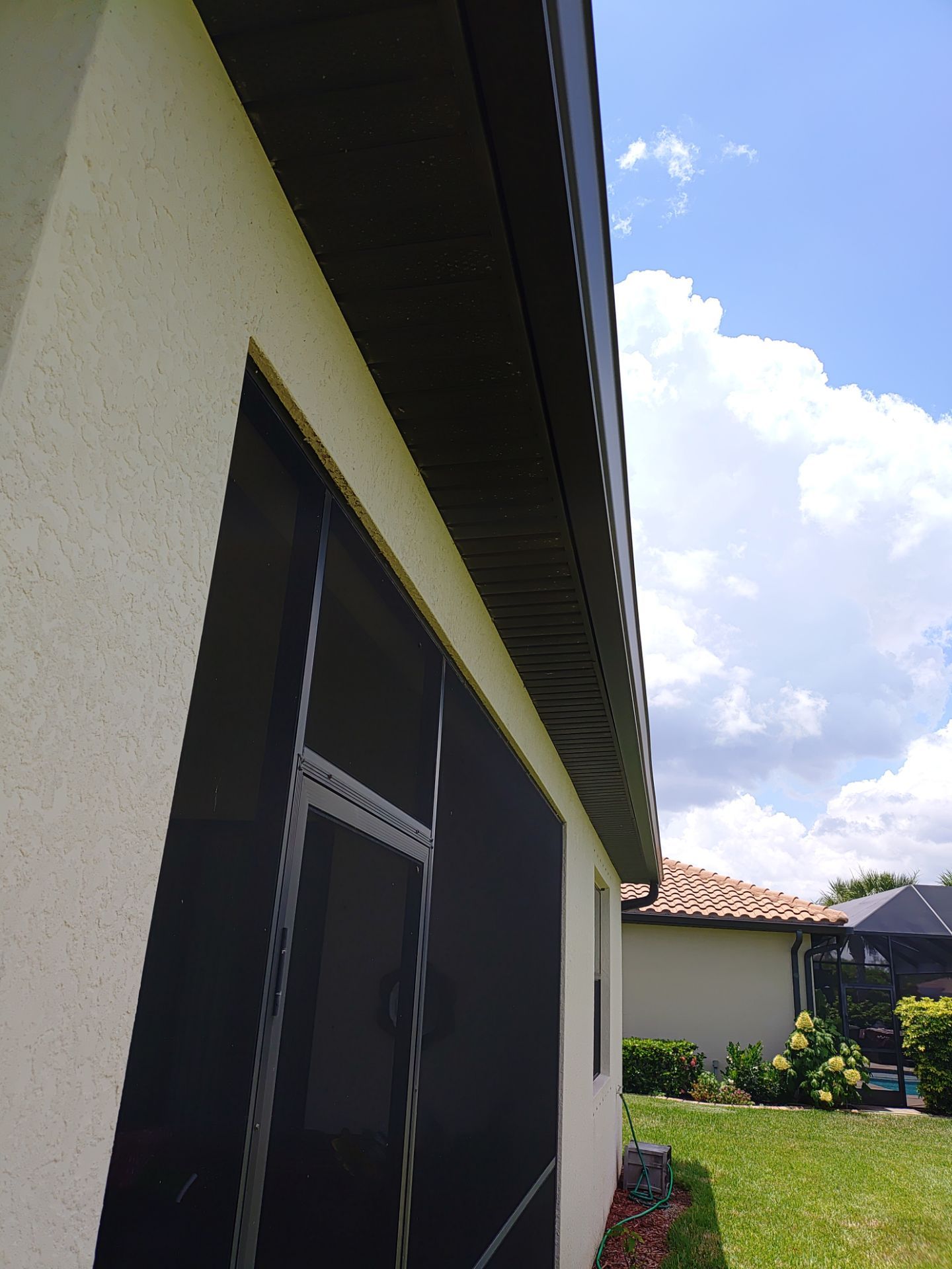 Black 6-Inch Seamless Gutters in Fort Myers FL by Gutter Professor by Gutter Professors