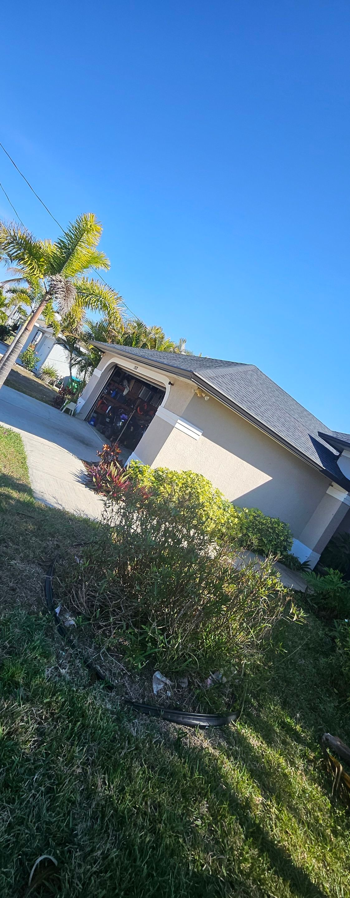 Dark Bronze Seamless Gutters using 6-Inch Seamless Gutters in Cape Coral FL by Gutter Professors