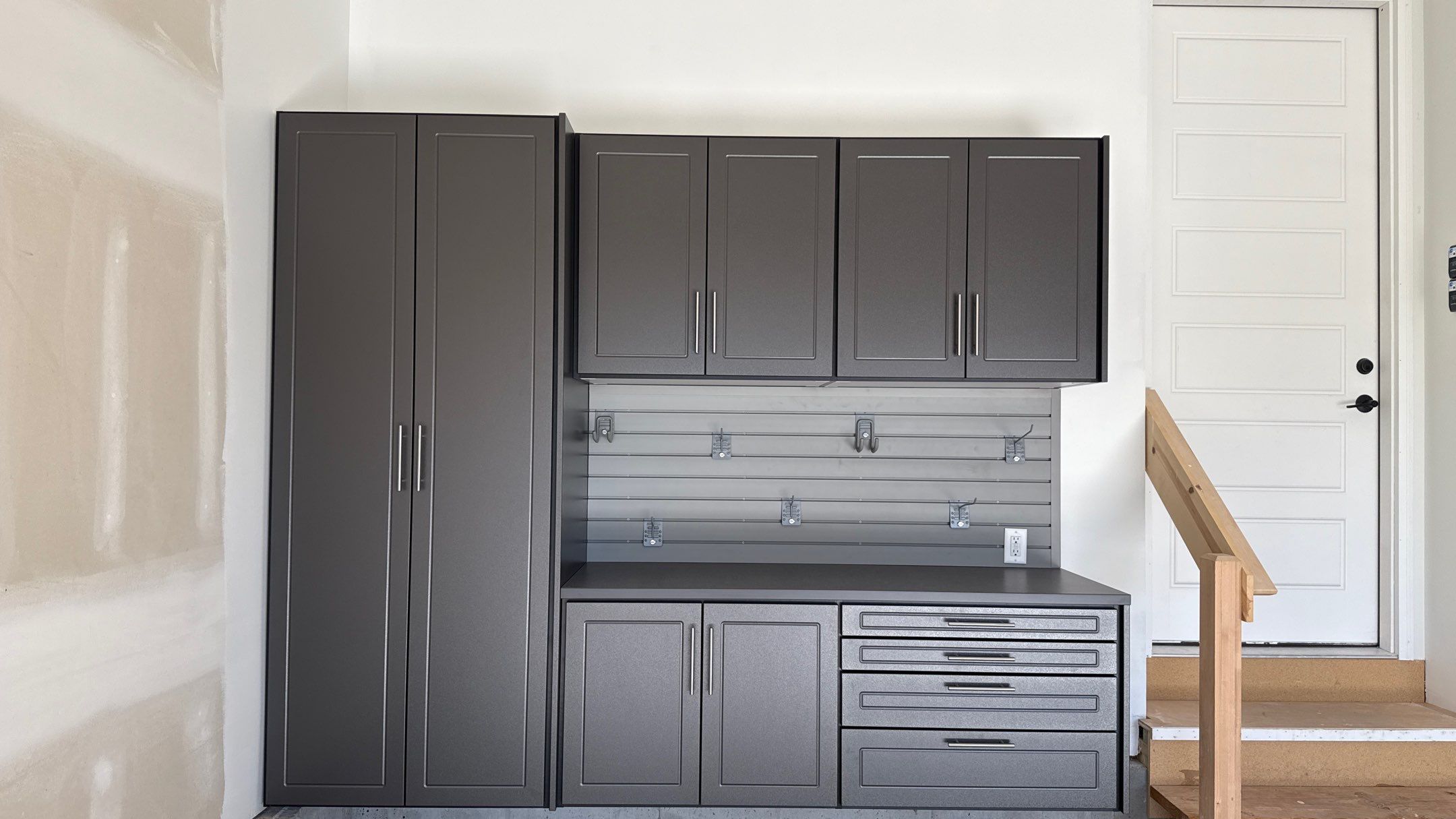 Nice Clean Look With These Pewter Cabinets by Banner Garage