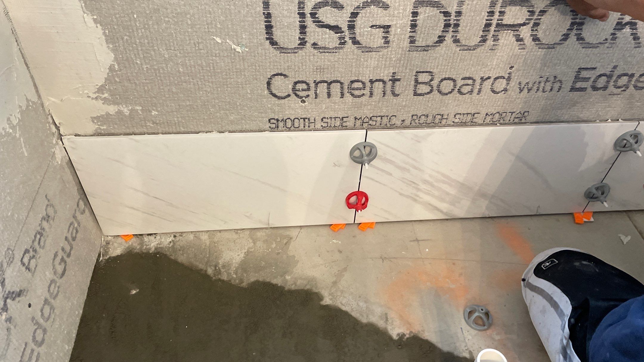 Bright Bathroom Remodel with Wall Removal, Stand Alone Tub and New Vanity by Footprints Floors of Coastal Carolina