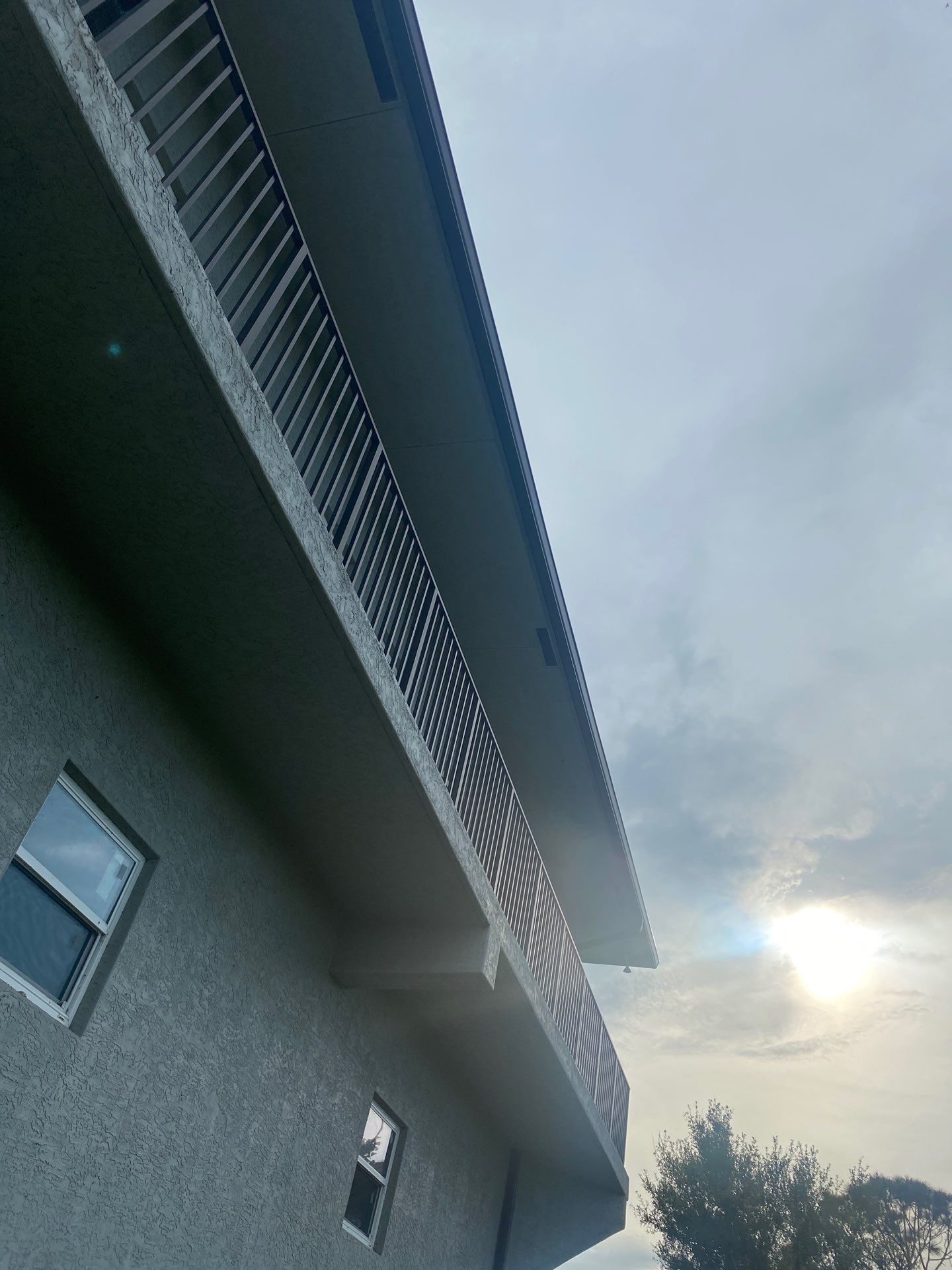 Black Seamless Gutters St. James City by Gutter Professors