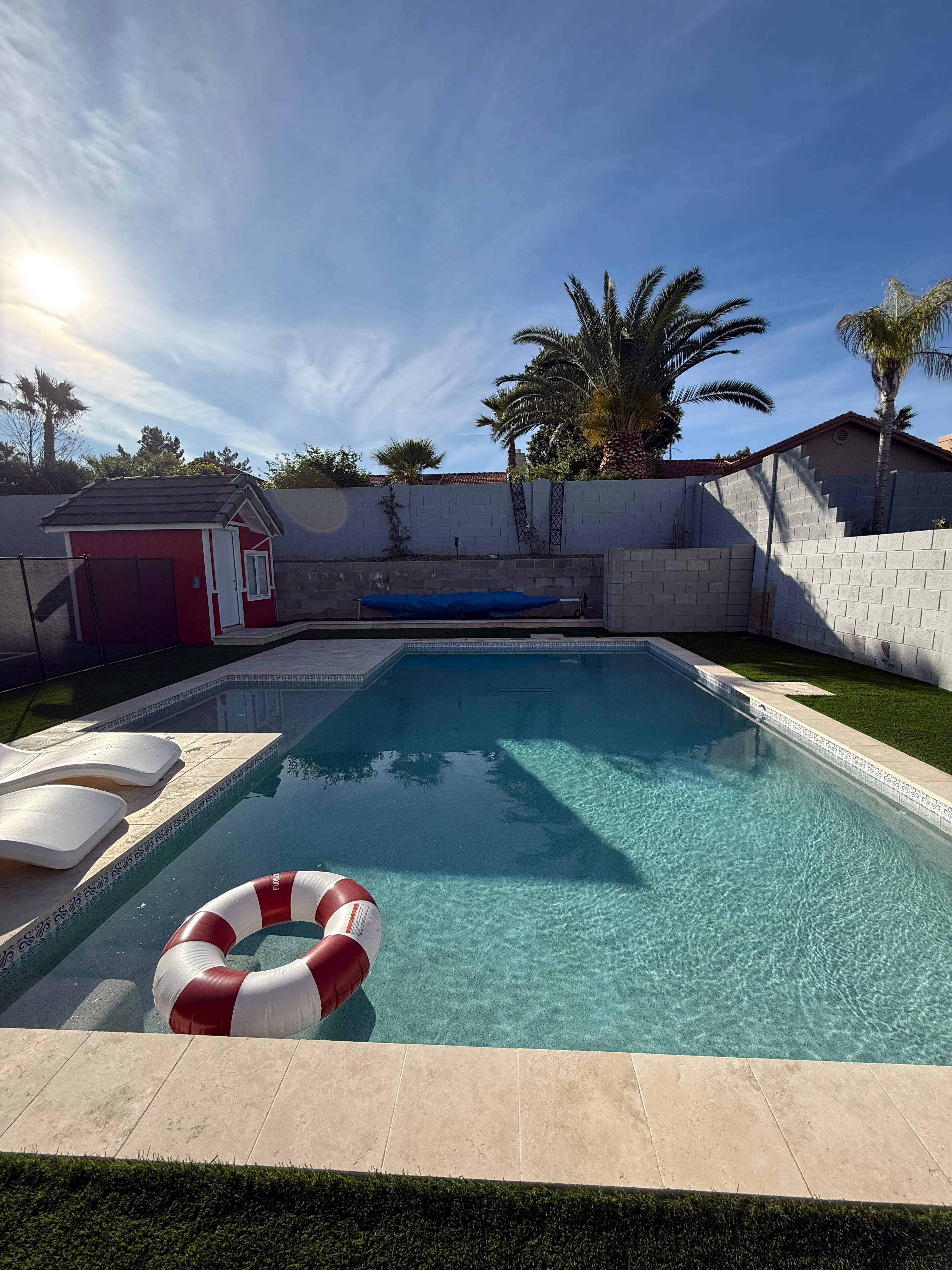 Pool build with baja step and pebble finish by Modern Pools