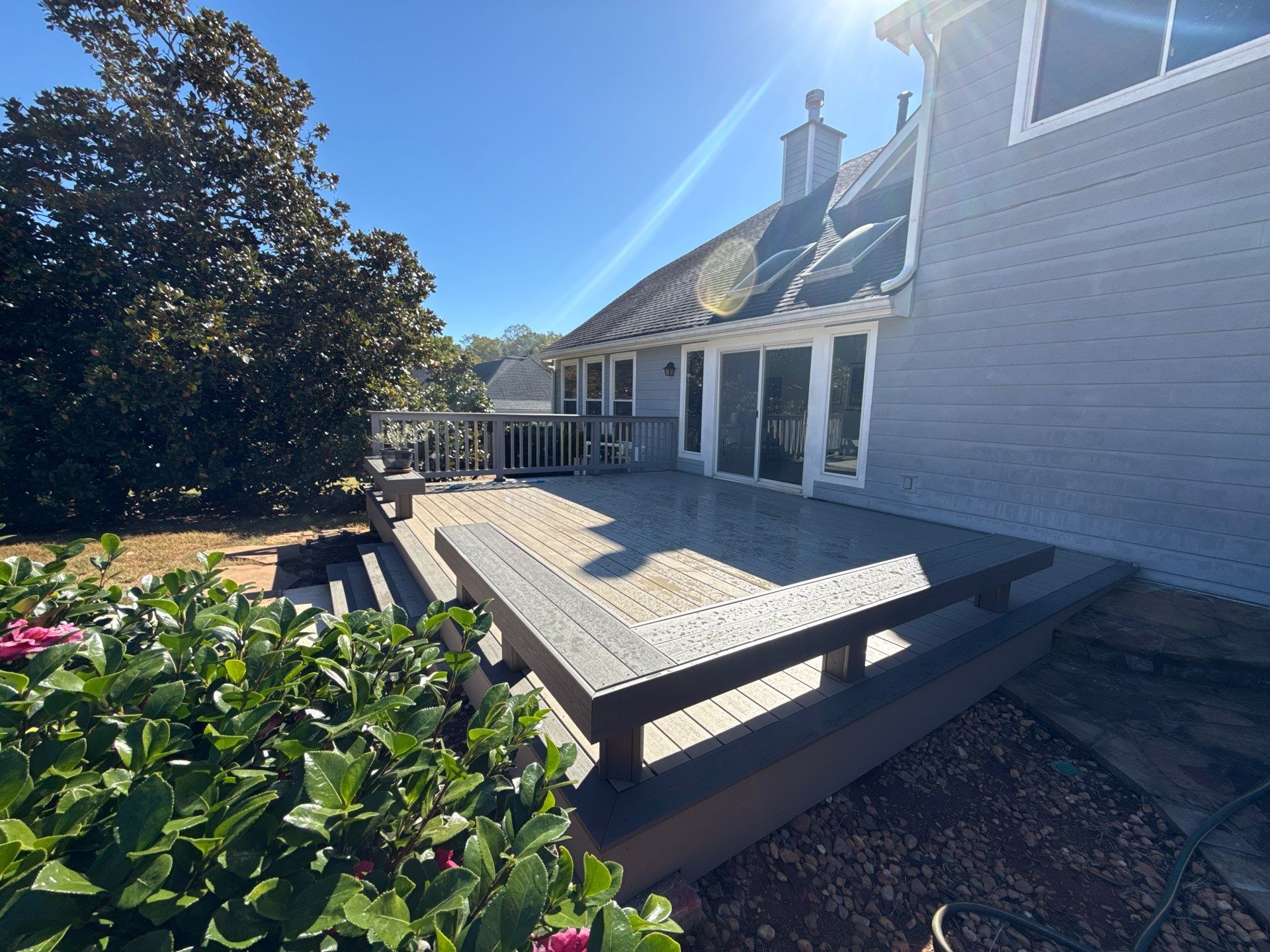 Custom Composite Deck with Integrated Seating in Roswell by Swift Home Renovations