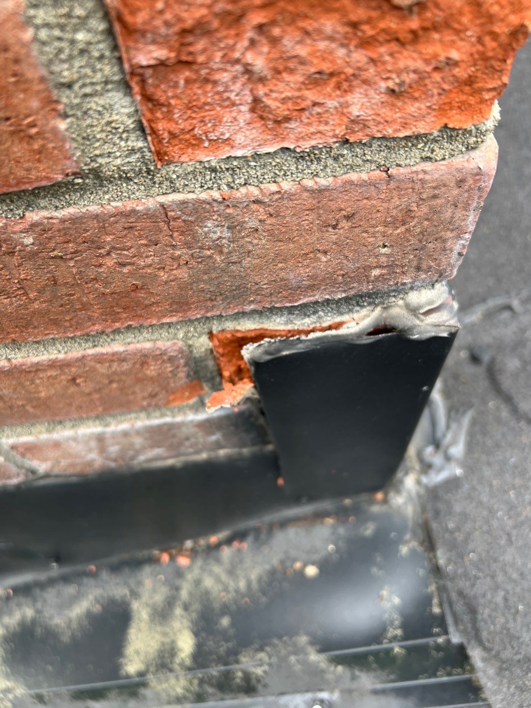Residential Roofing Repair using Chimney counter flashing by Nitro Roofing and Construction