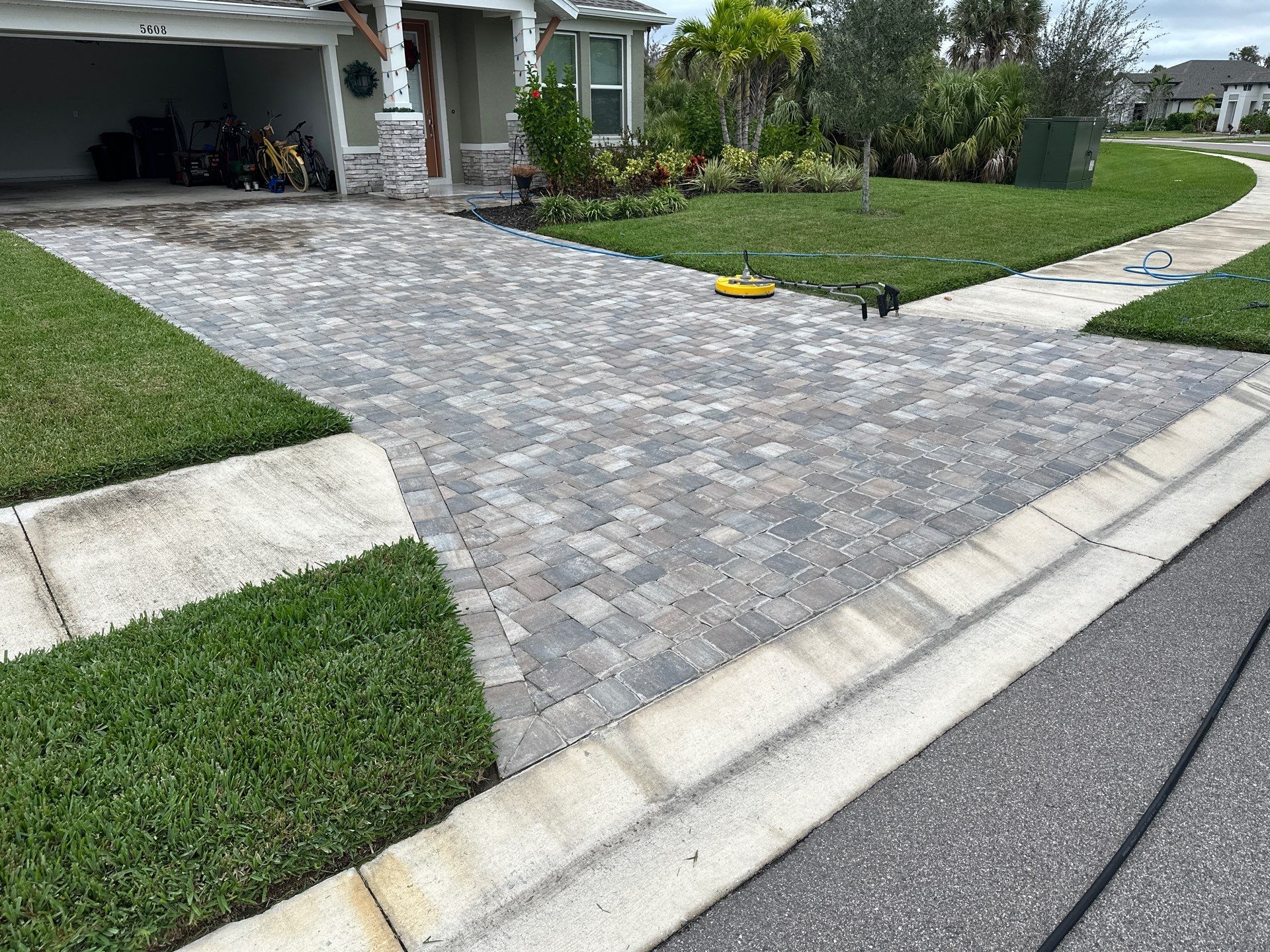 House Wash, Paver Driveway & Sidewalk Cleaning + Sanding & Sealing in Trevesta Community, Palmetto, FL by Sunshine AquaWash