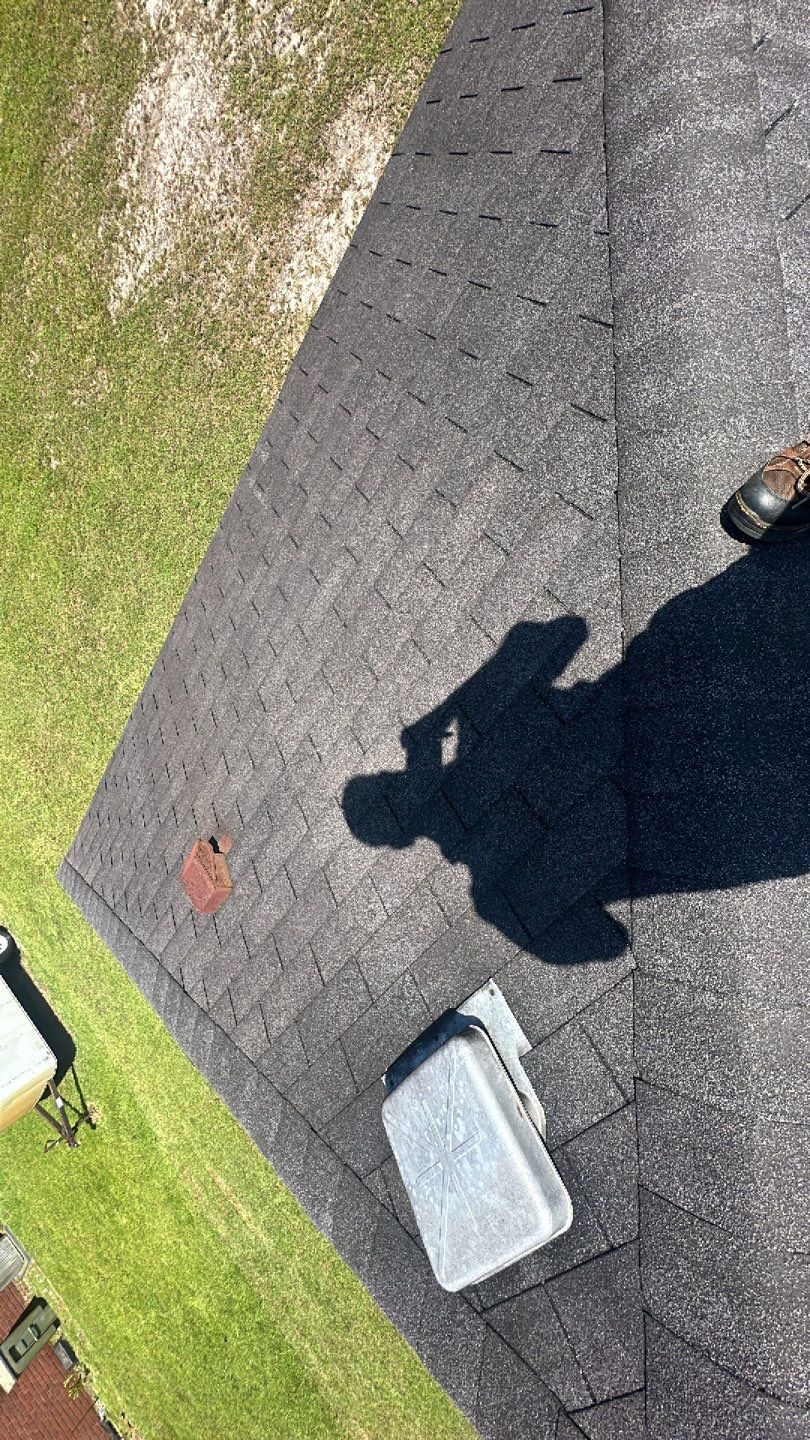 Residential Roofing Installation using Benton 26Ga 1inc Snapcock Metal Roof KYNAR Matte Black by Talya Roofing