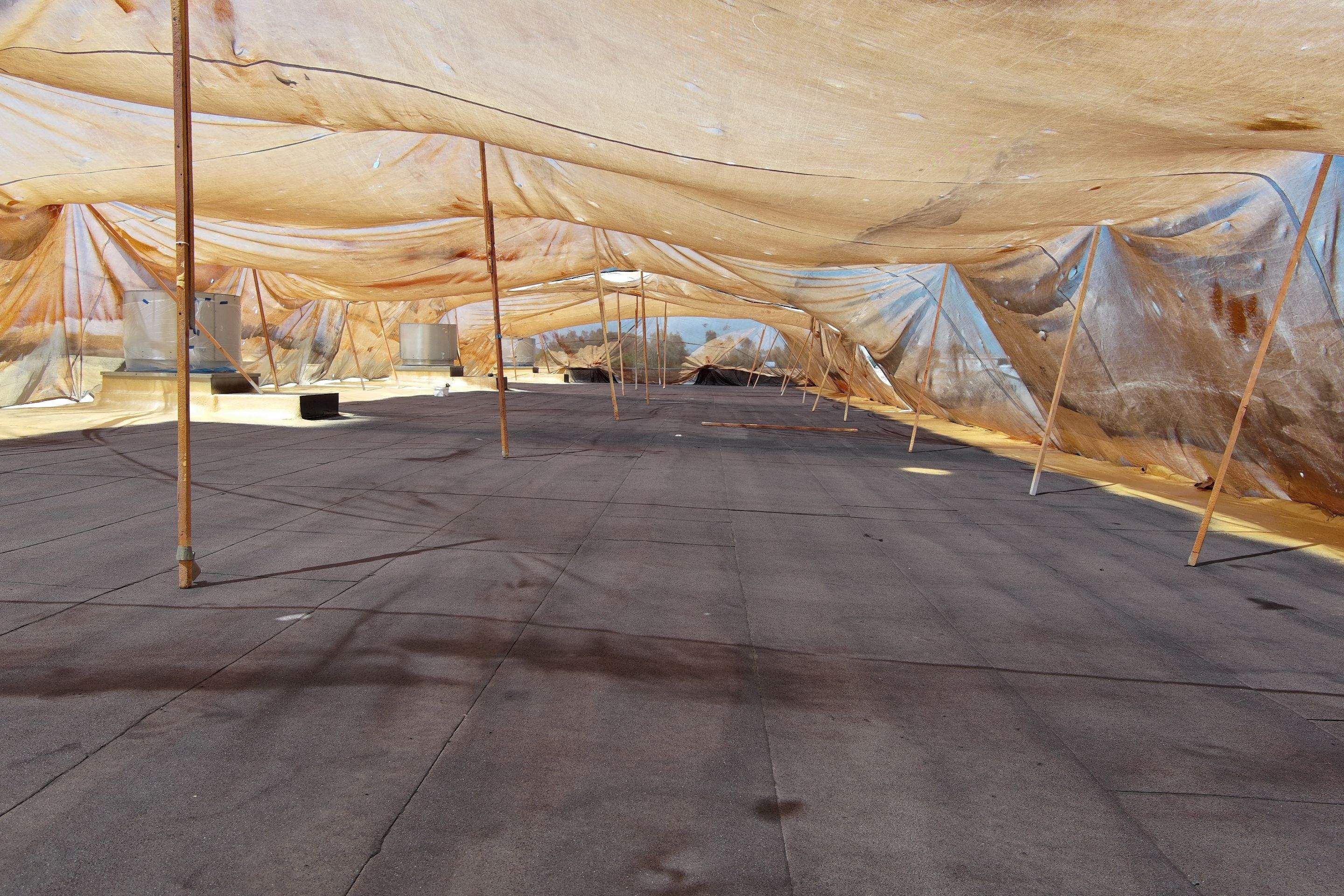 Pro Farms Spray foam roofing project by Straight Edge Roofing Inc