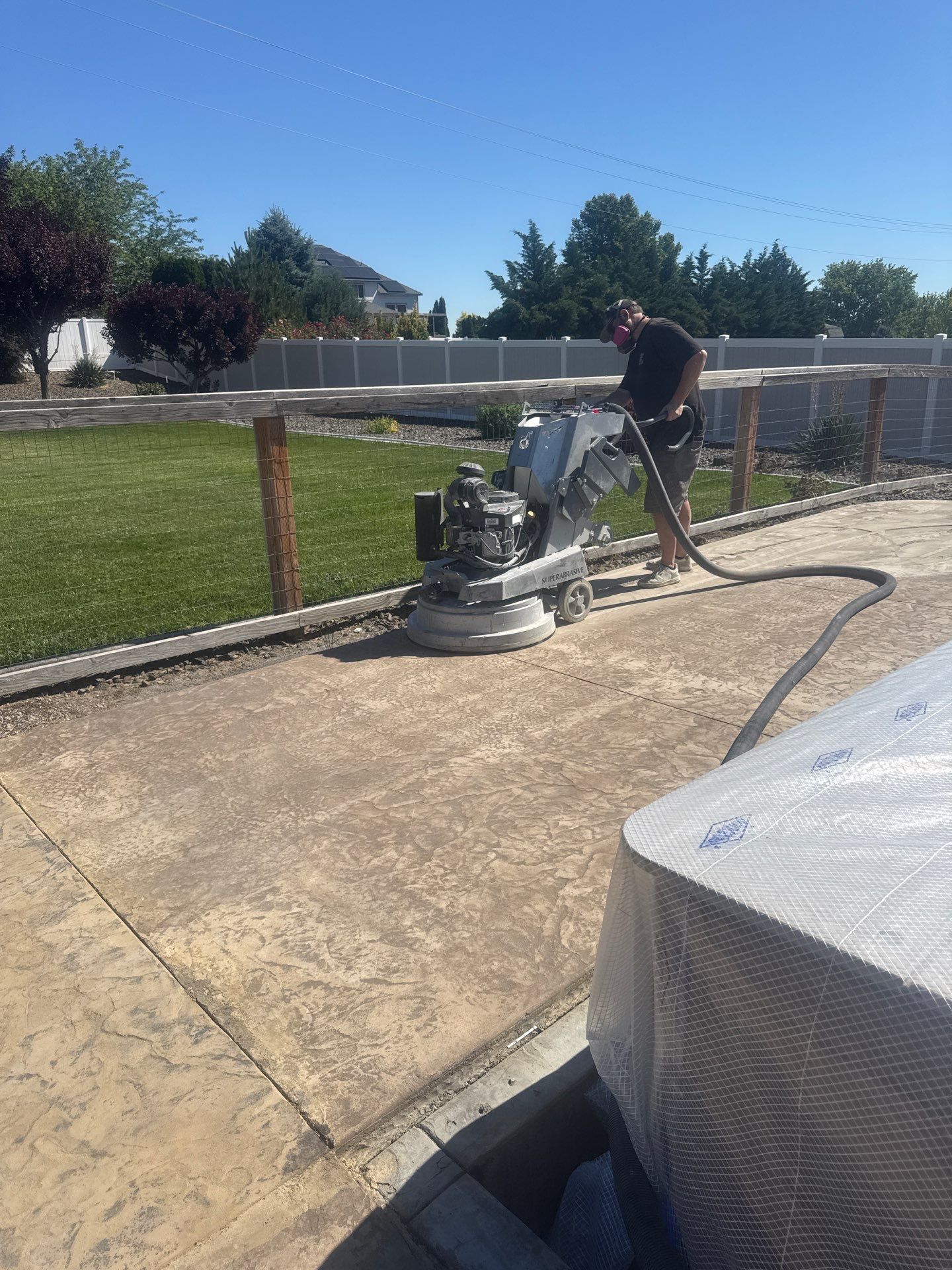 Pebble Beach Flake Coating for Kennewick Pool Deck and Patio by Croc Coatings, LLC