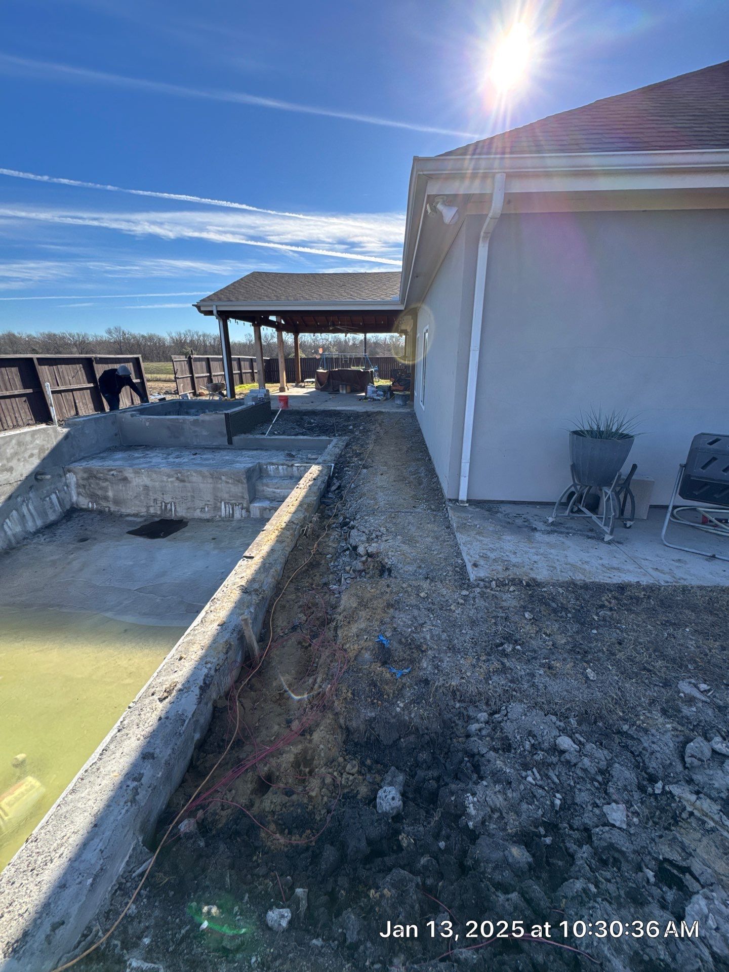 Geometric Pool and Spa with Stone Water Feature Wall by Pinnacle Pools and Spas - DFW