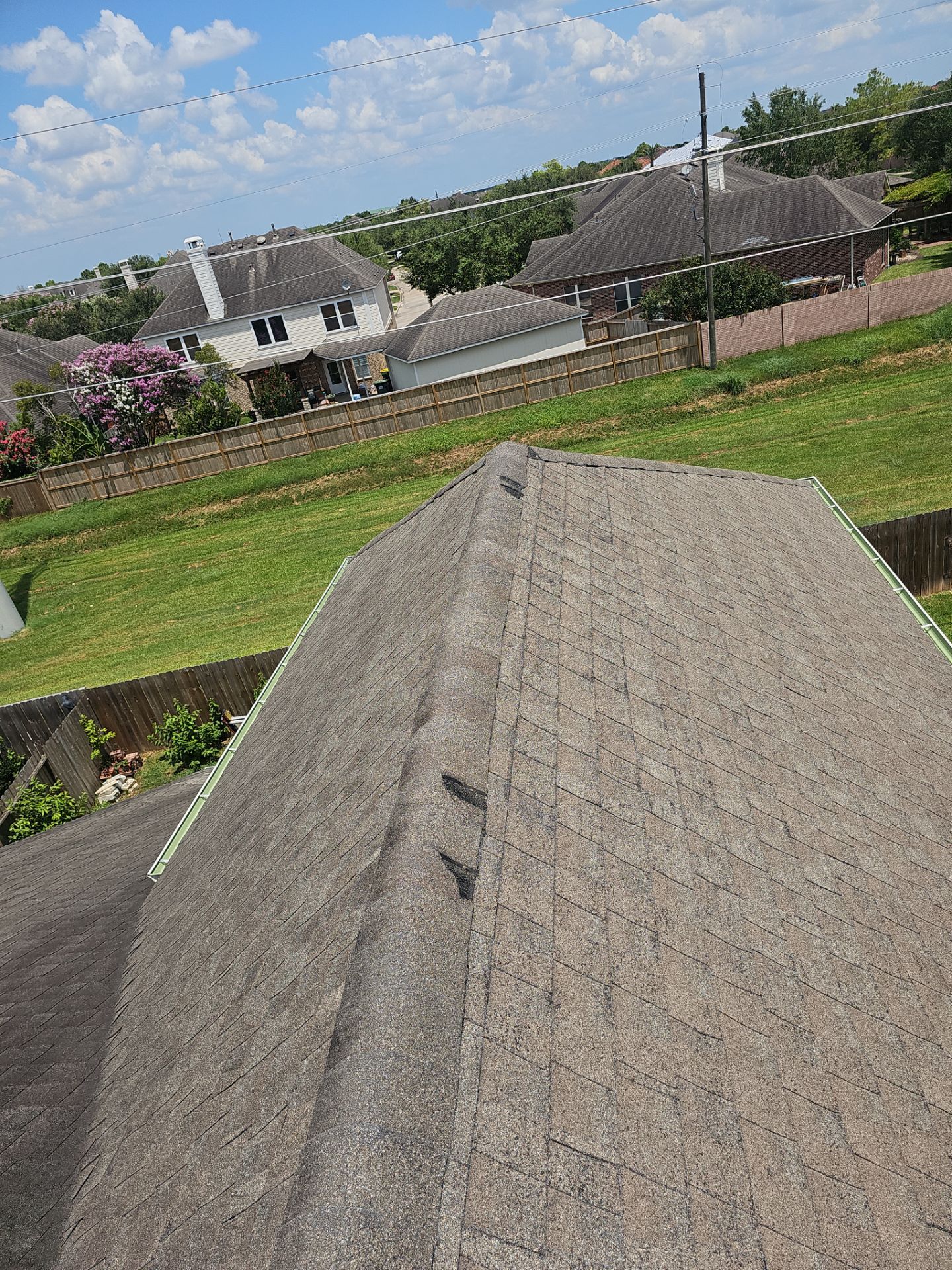 Hail Damage using Owen's Corning Duration (Lifetime) Shingles by Roof Repair Company