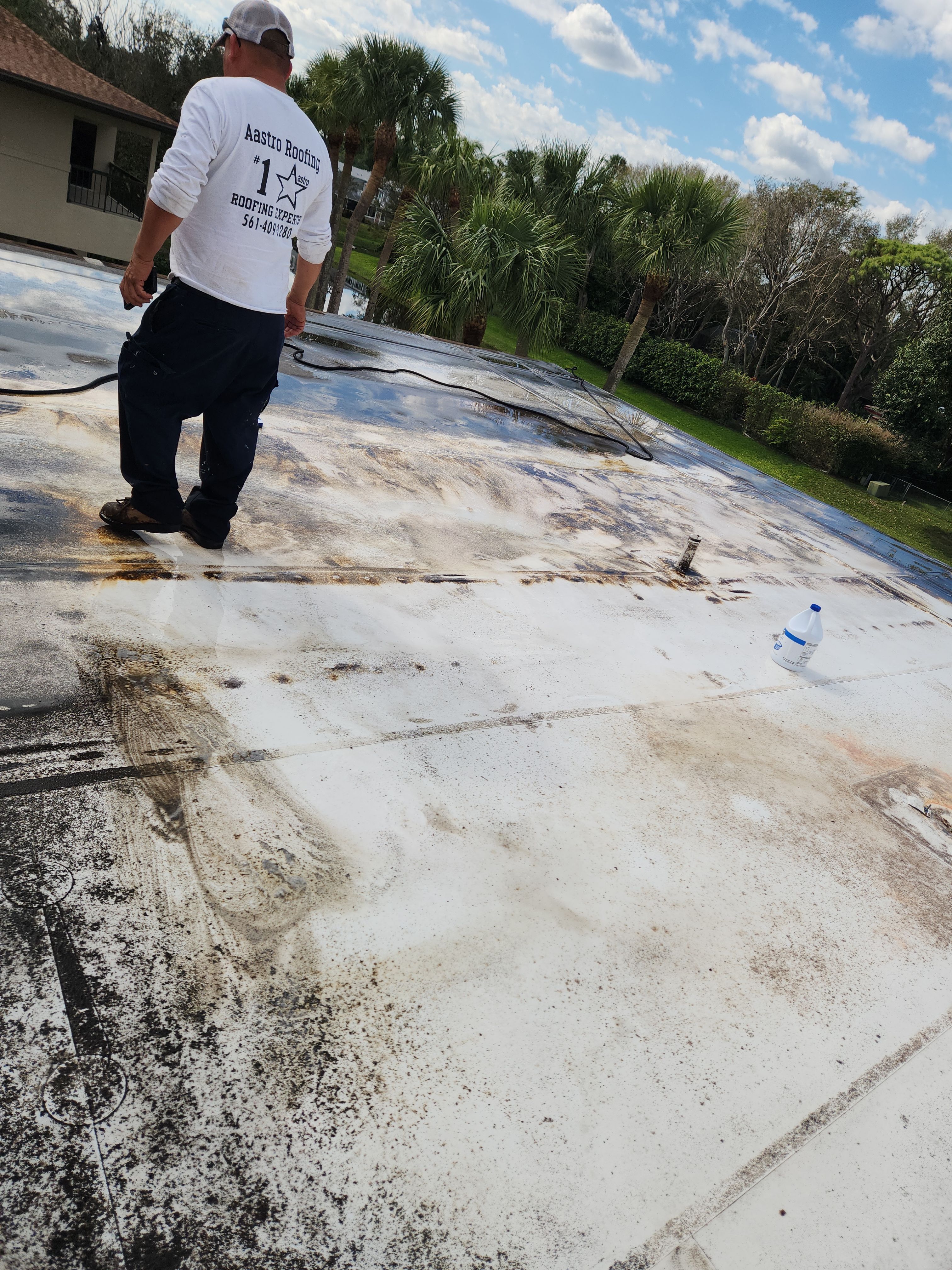 Reflective Silicone Roof Coating and Maintenance in Palm Beach Gardens by Aastro Roofing