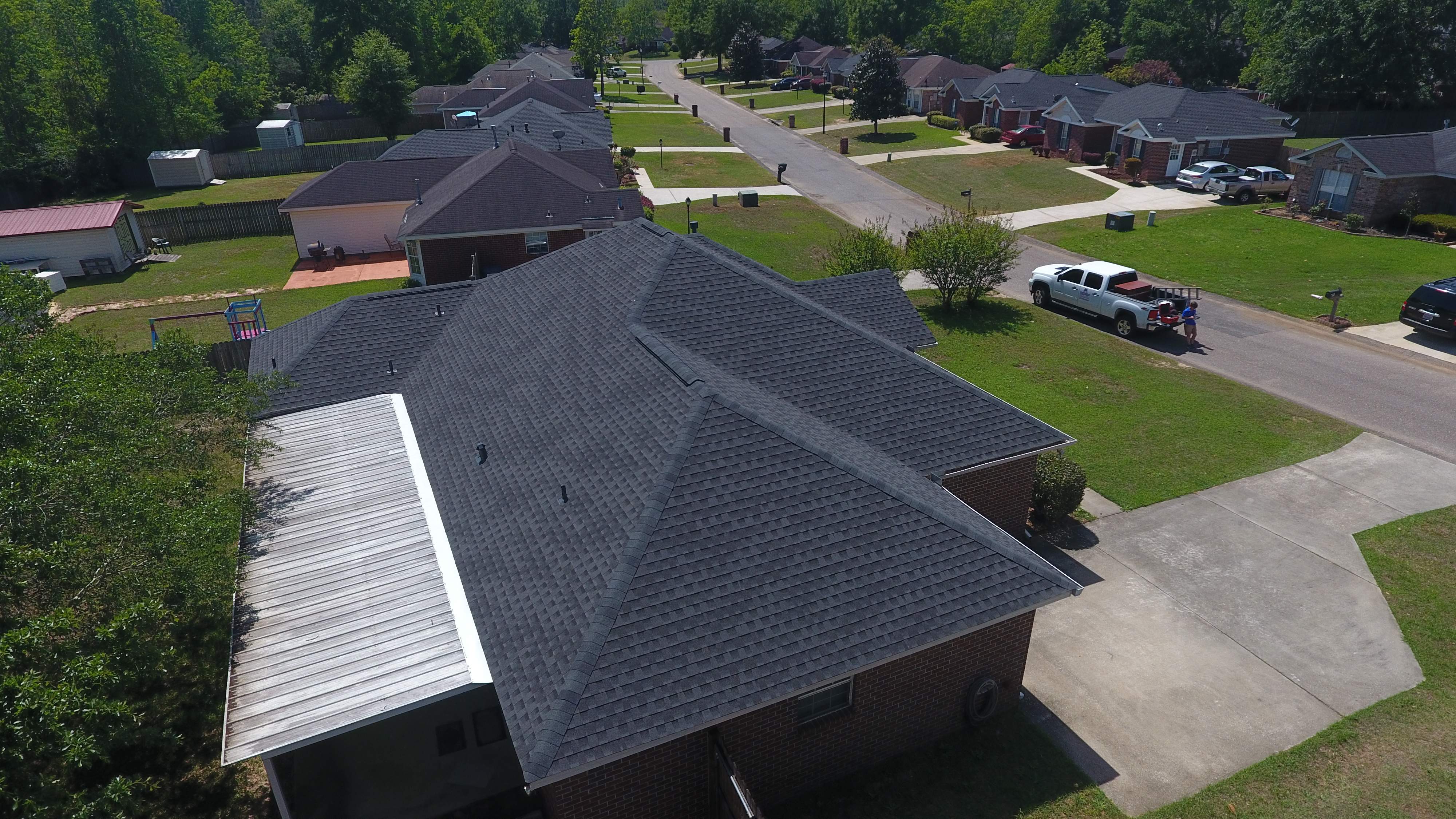 Residential Roofing Installation using Roof Replacement by American Roofing & Construction LLC