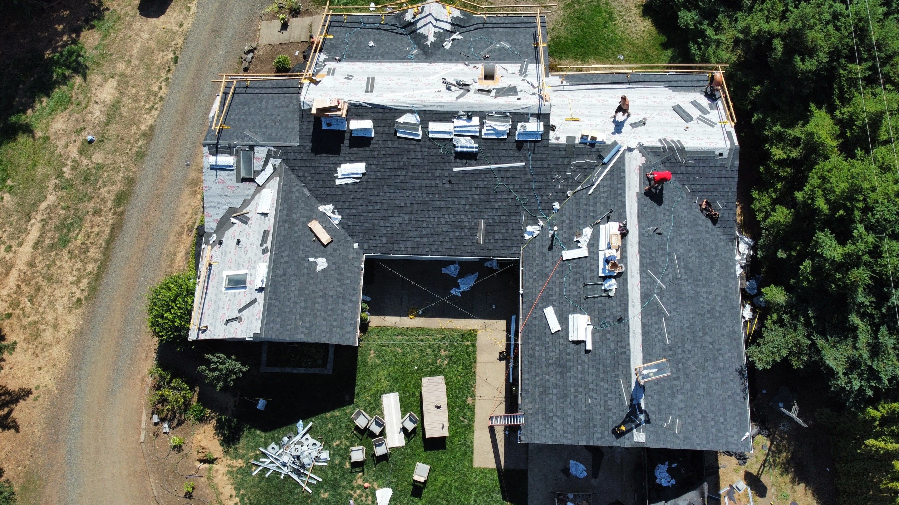 Residential Roofing Installation using IKO Dynasty (Color: Granite Black) by Orezona Building & Roofing Company, Inc.