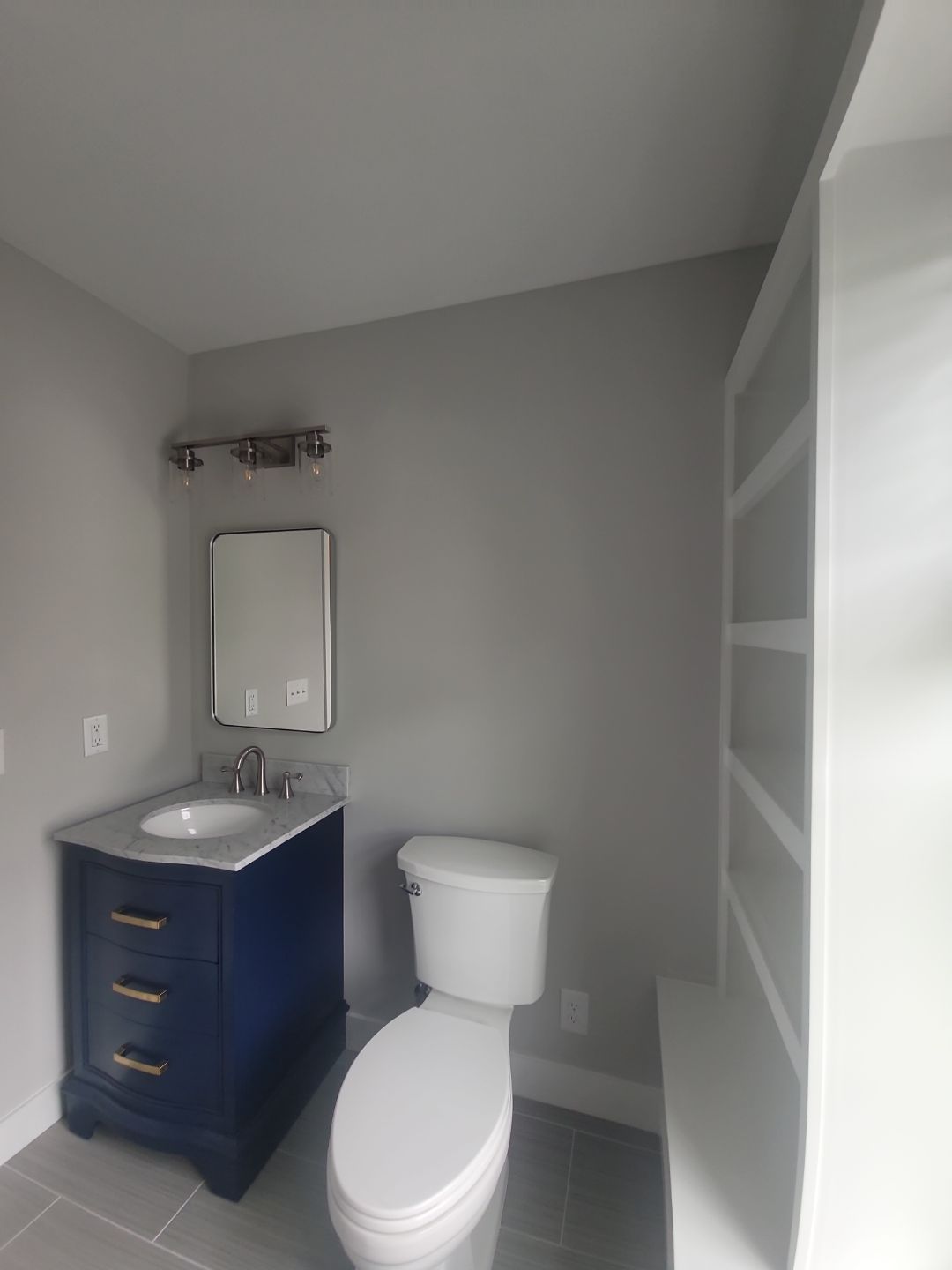 From Rafters to Retreat: An Attic Transformed with a Luxe Bath Escape by Elite Remodeling and Design LLC